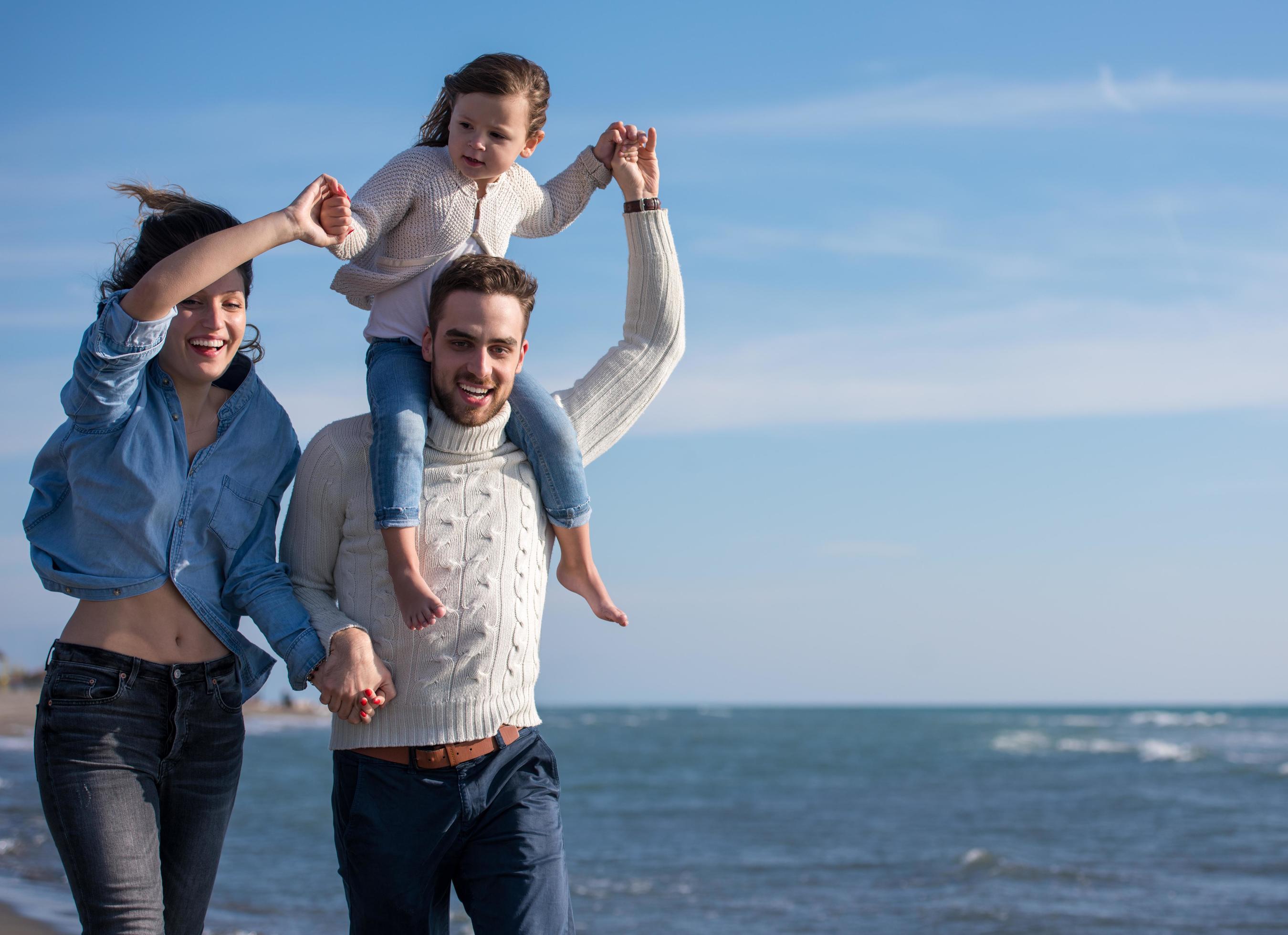 Young family enjoying vecation during autumn Stock Free