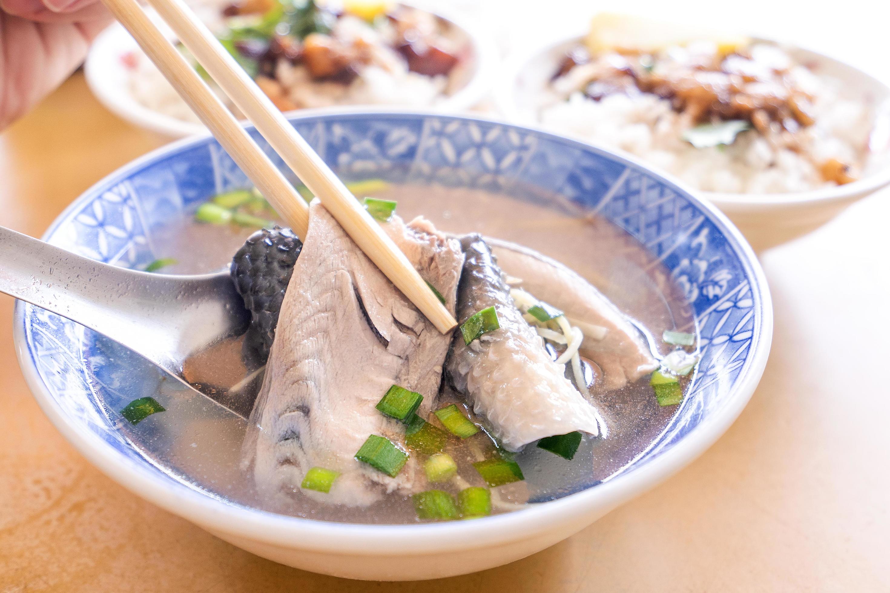 Milkfish skin soup, distinctive Taiwan delicacy food in Tainan. Famous meal set for lunch or breakfast with vegetable, top view, copy space, close up Stock Free