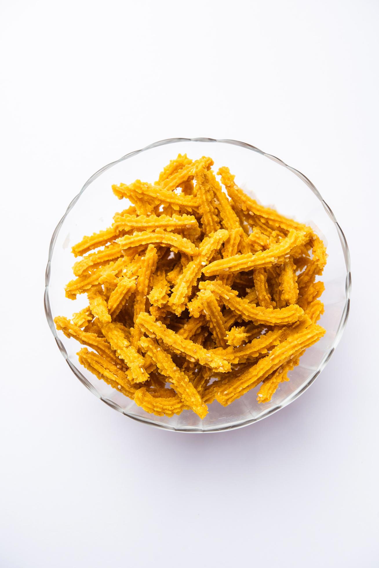 Bhajni chakli sticks or crunchy murukku snack made using diwali festival, favourite munching food Stock Free