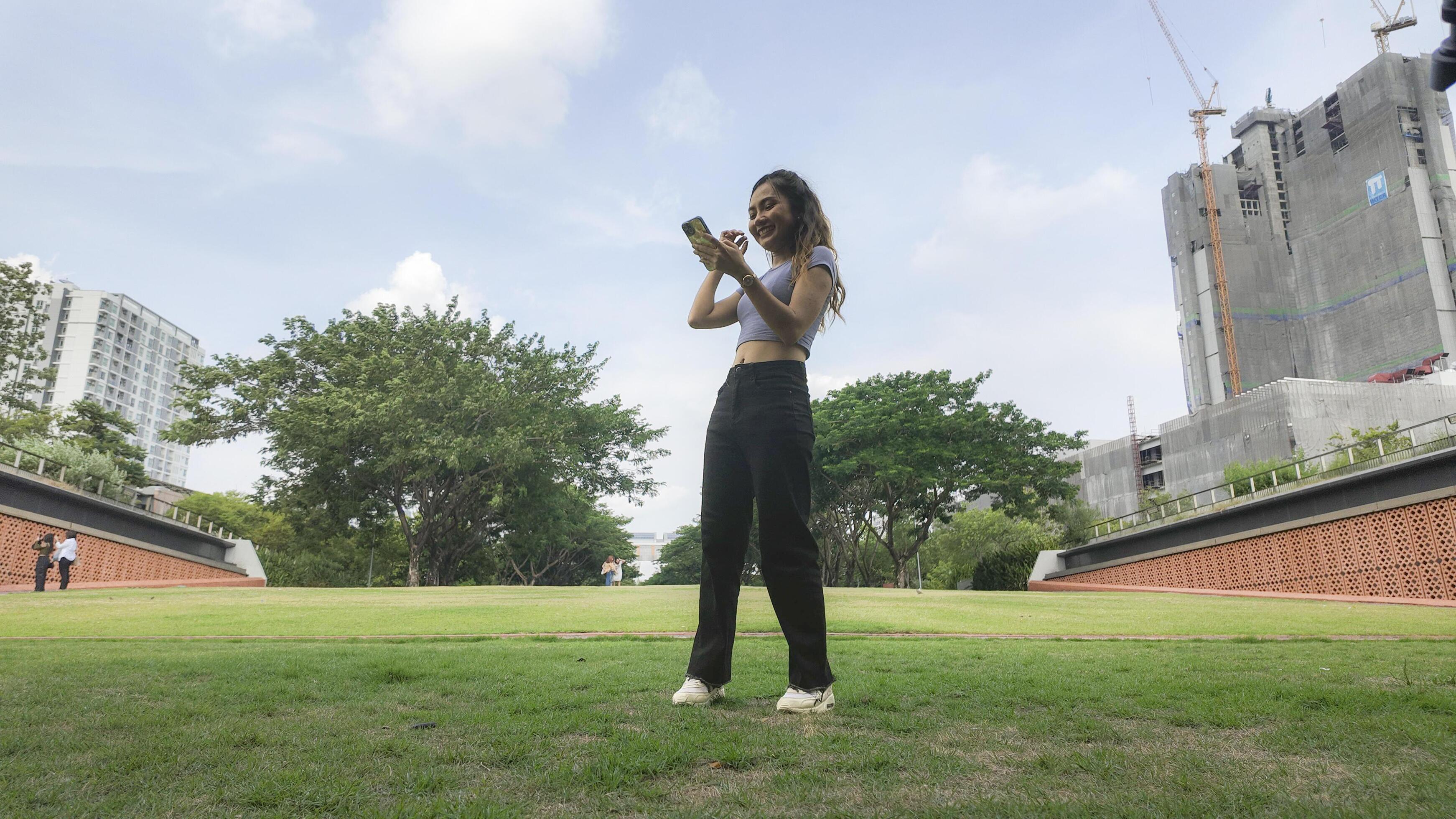 
									Asian women do freestyle hip hop and breakdancing in a public space in the middle of the city. With a cheerful and happy attitude Stock Free