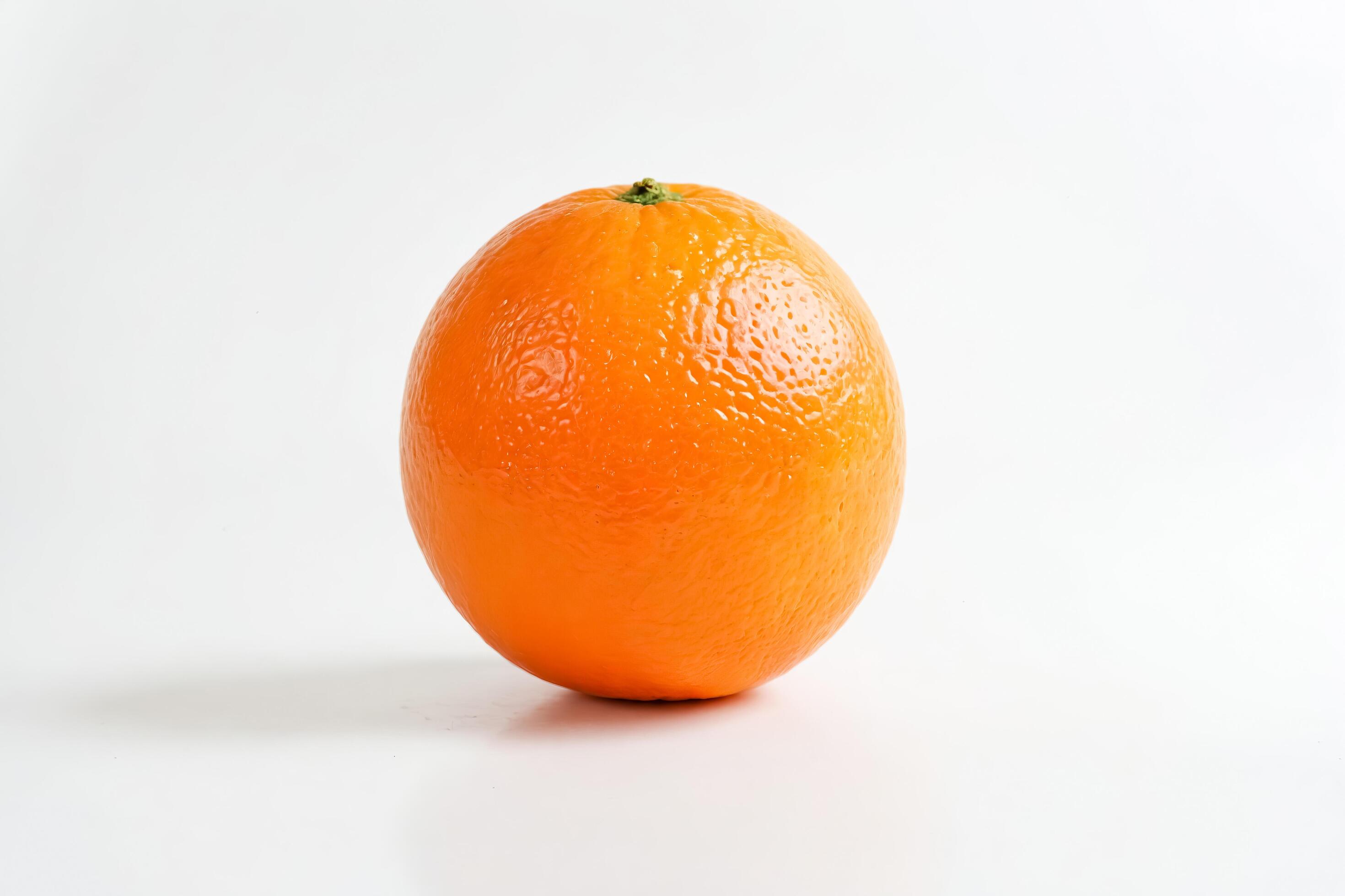 Single Orange on White Background Stock Free