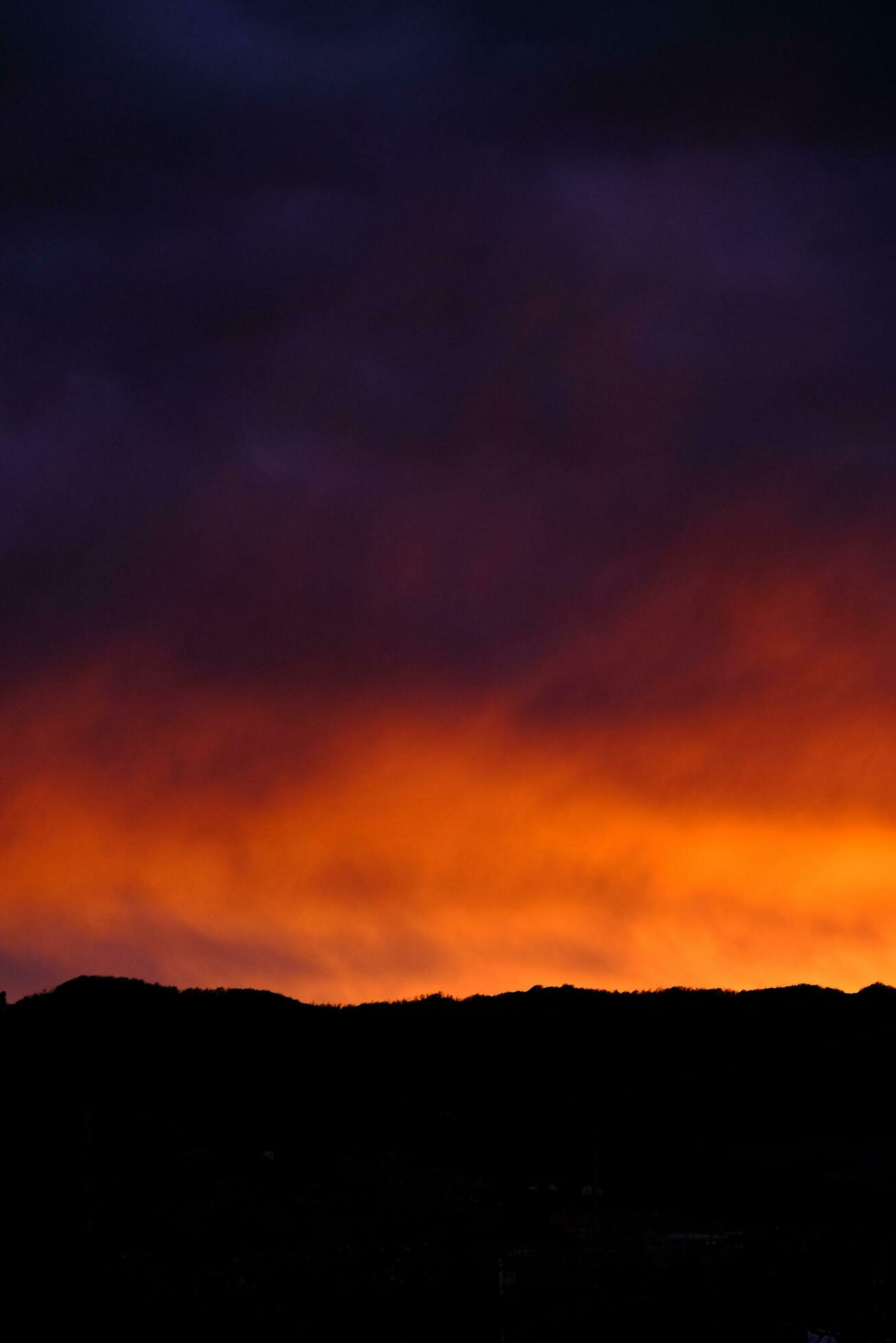 fiery red sunset texture during a summer evening in western Liguria in 2023 Stock Free