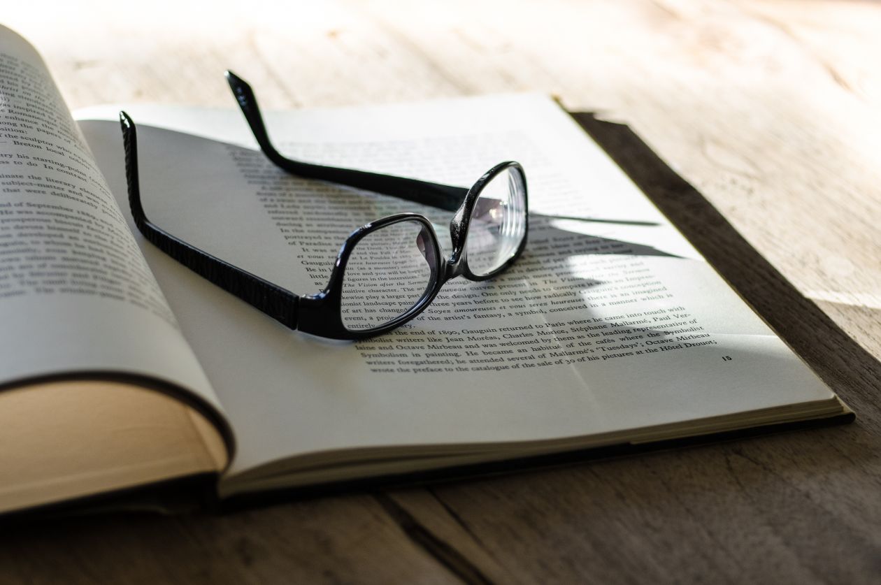 Glasses and a book Stock Free