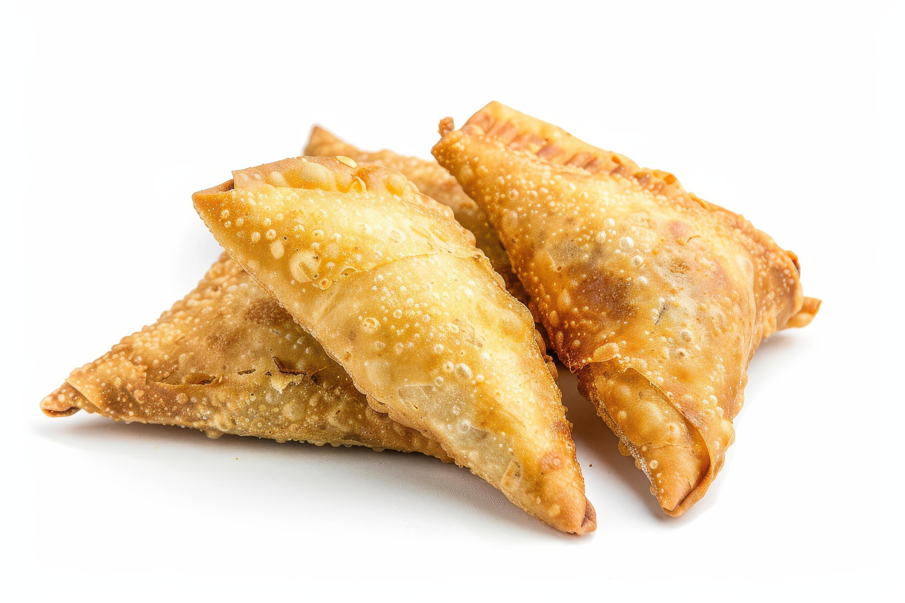 Three Golden Brown Fried Samosas on a White Background Stock Free