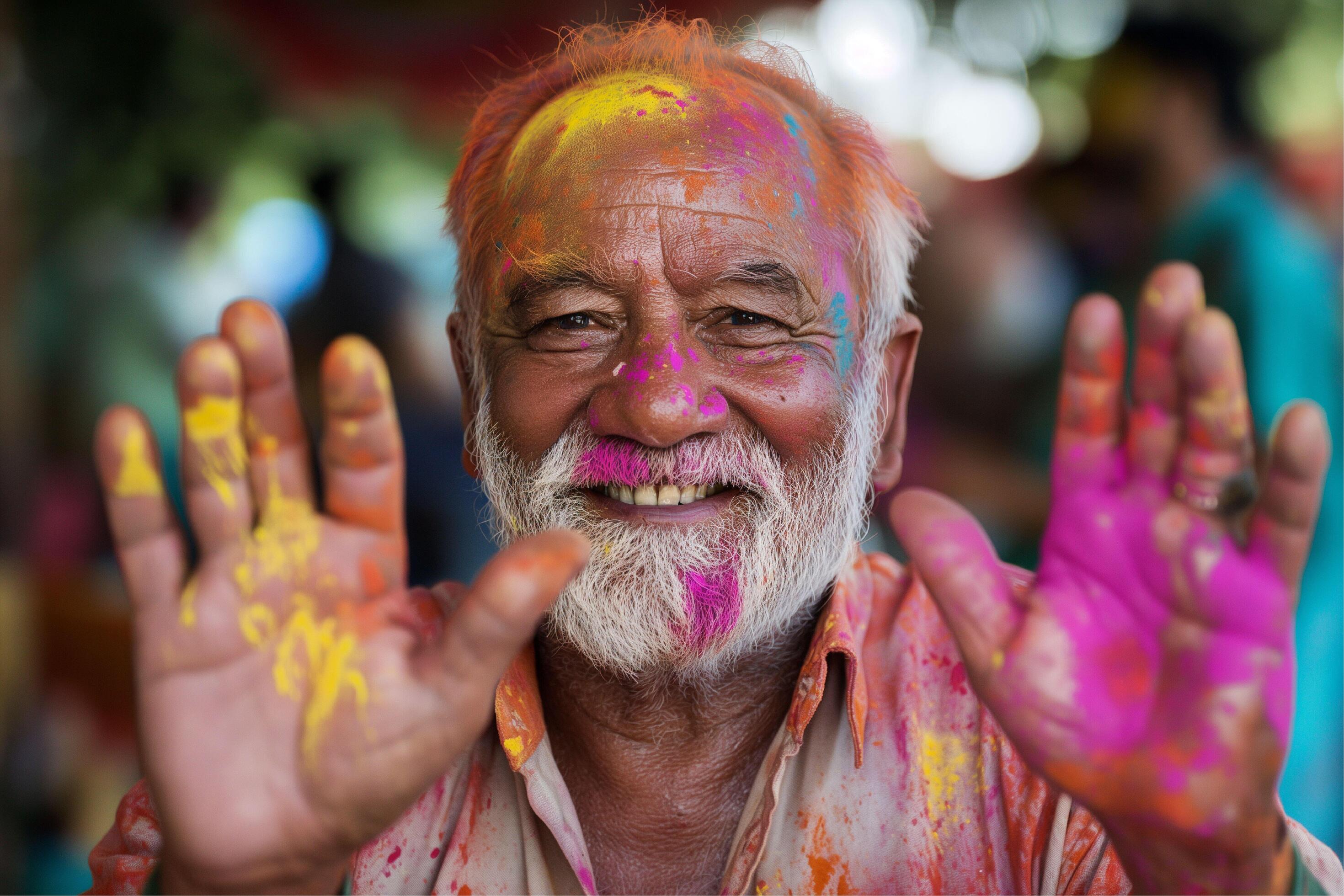 Portrait of a indian man playing holi Stock Free