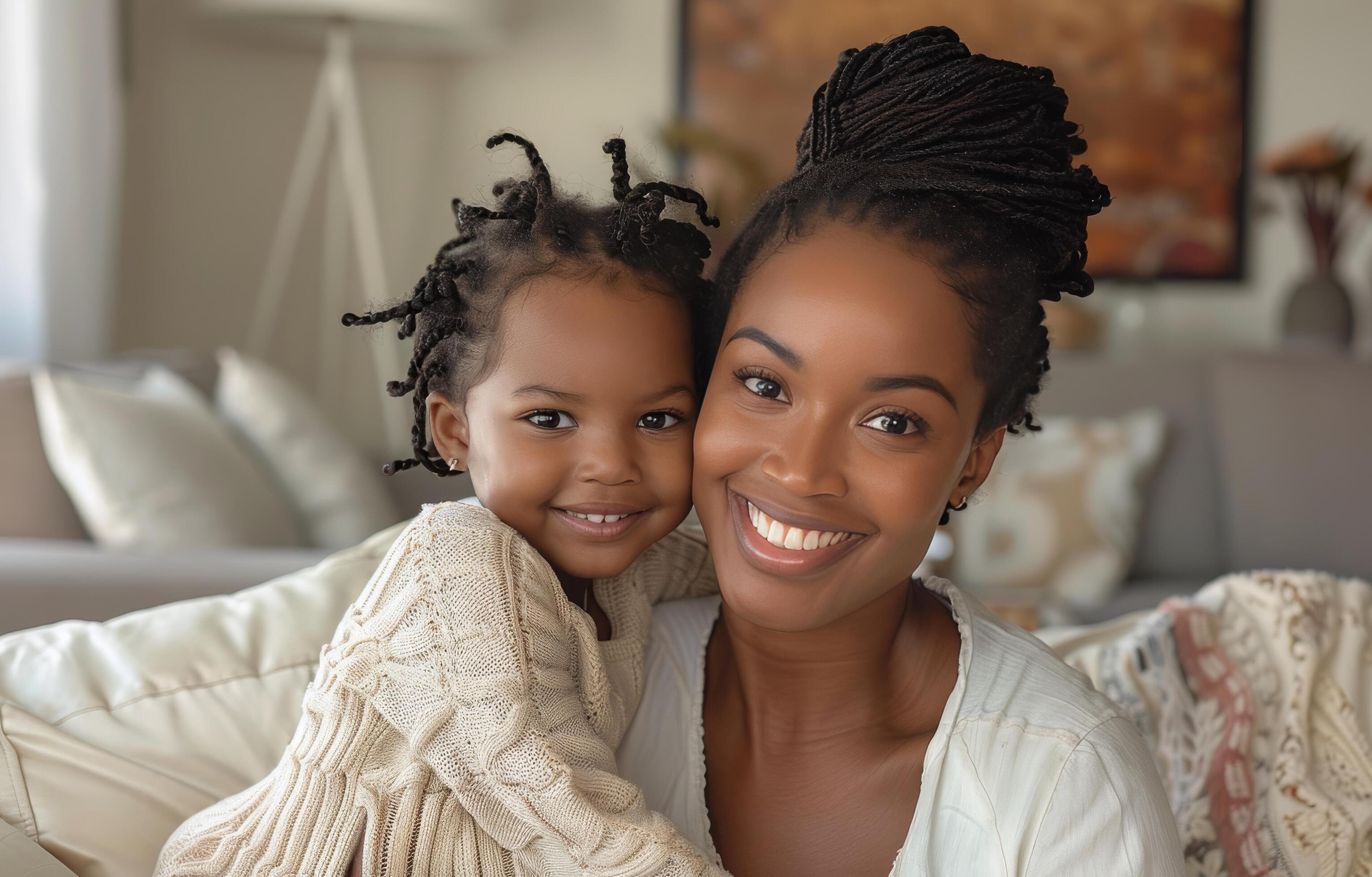 Happy Mother and Daughter Smiling Together in a Cozy Home Interior Stock Free