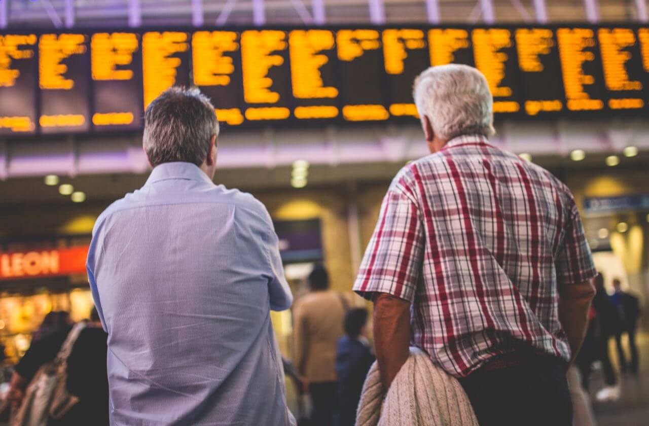 Checking Timetable at Train Station Stock Free