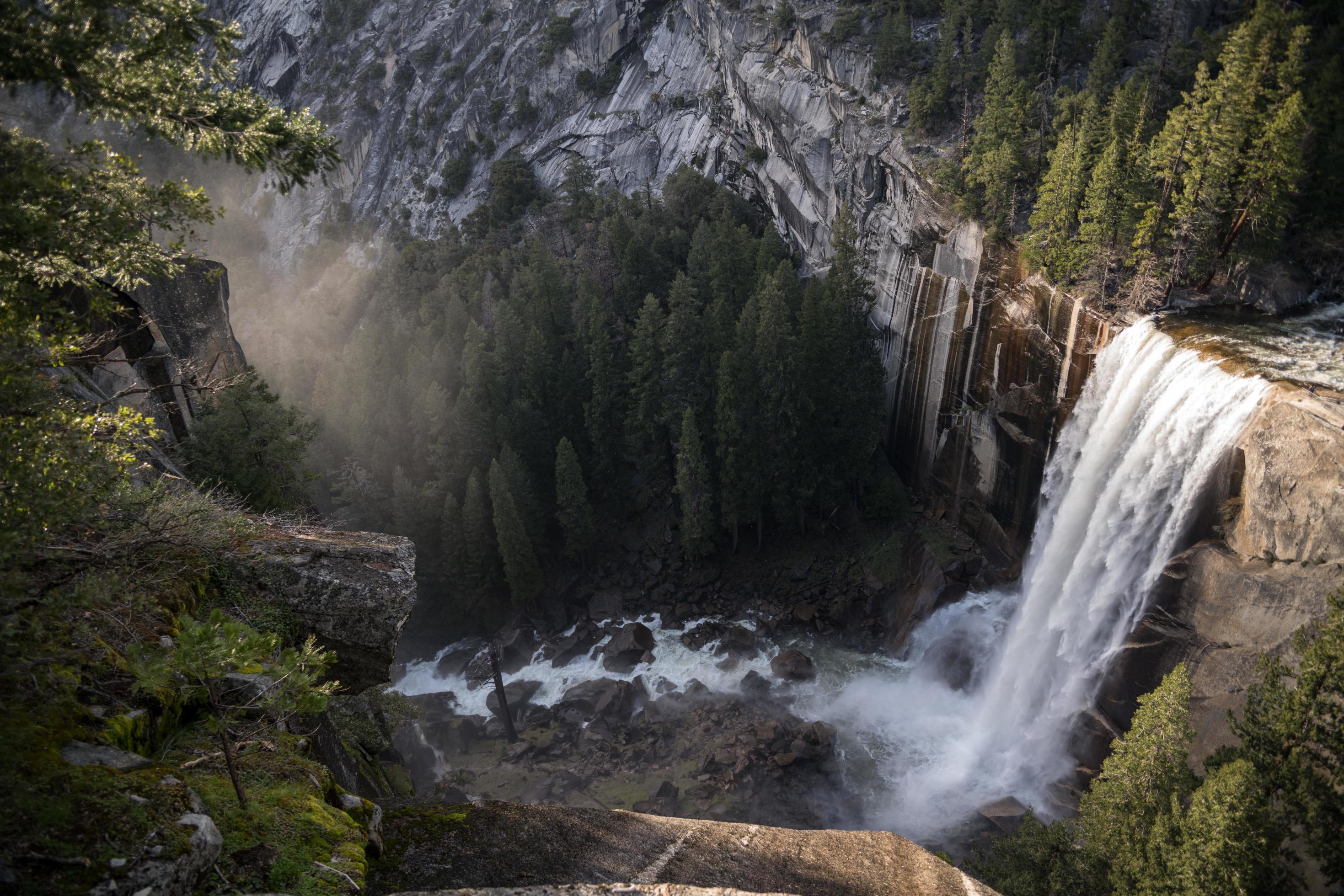 Beautiful waterfall in mountain valley Stock Free