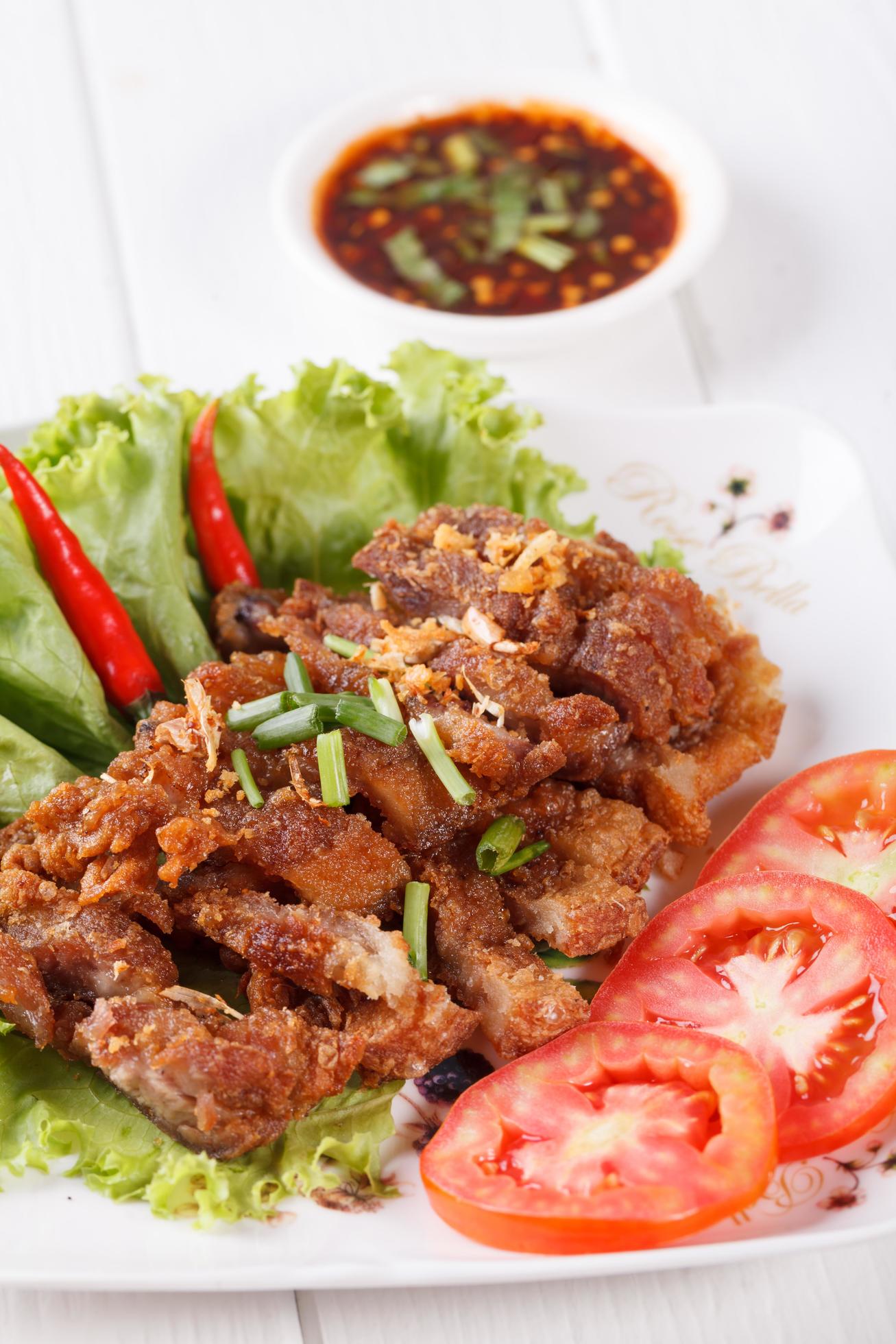 streaky pork fried with spicy dipping sauce, Thai food Stock Free