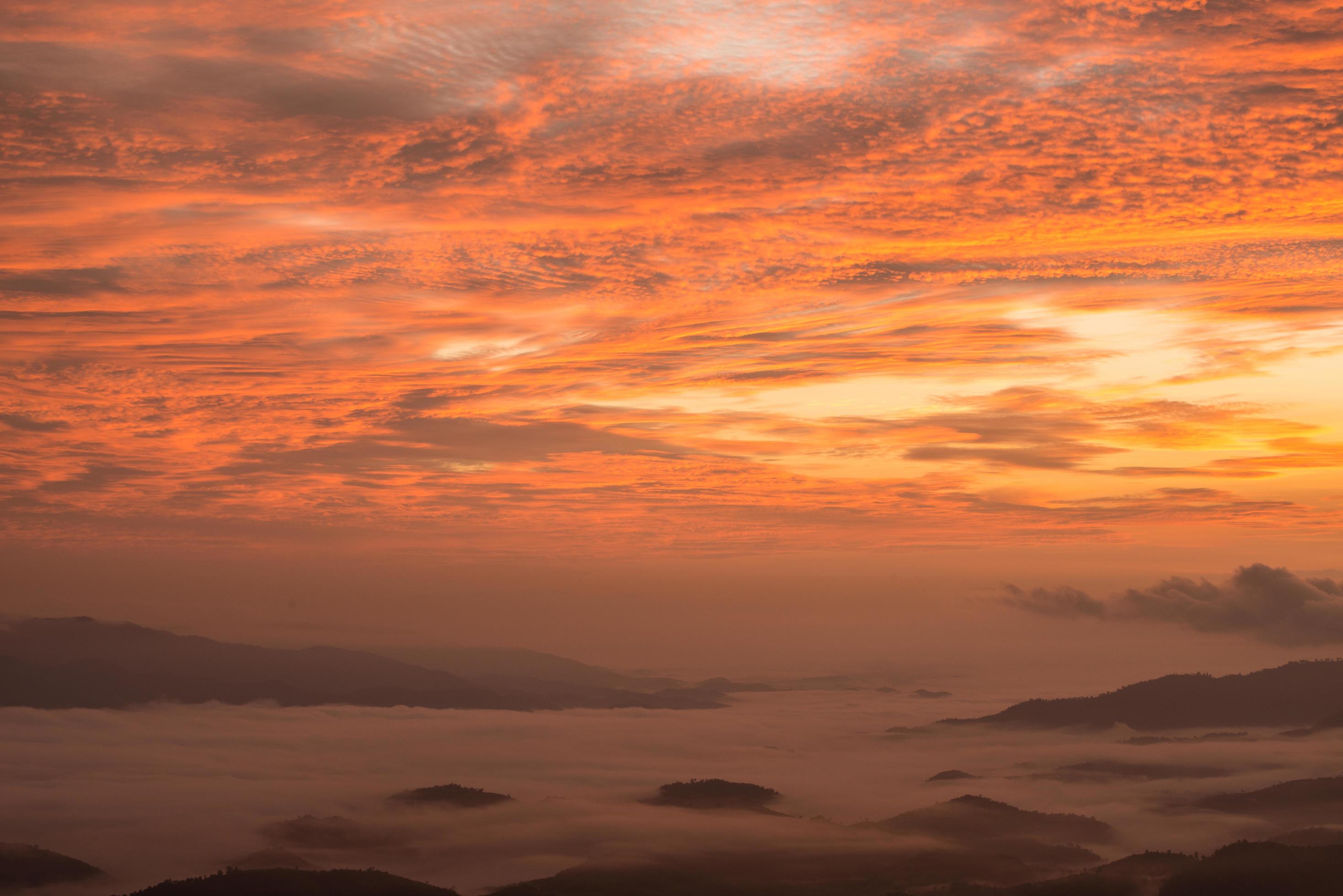 Morning sunrise view during the twilight view from Doi Kart Phee the highland mountains in Chiang Rai the northern region of Thailand. Stock Free