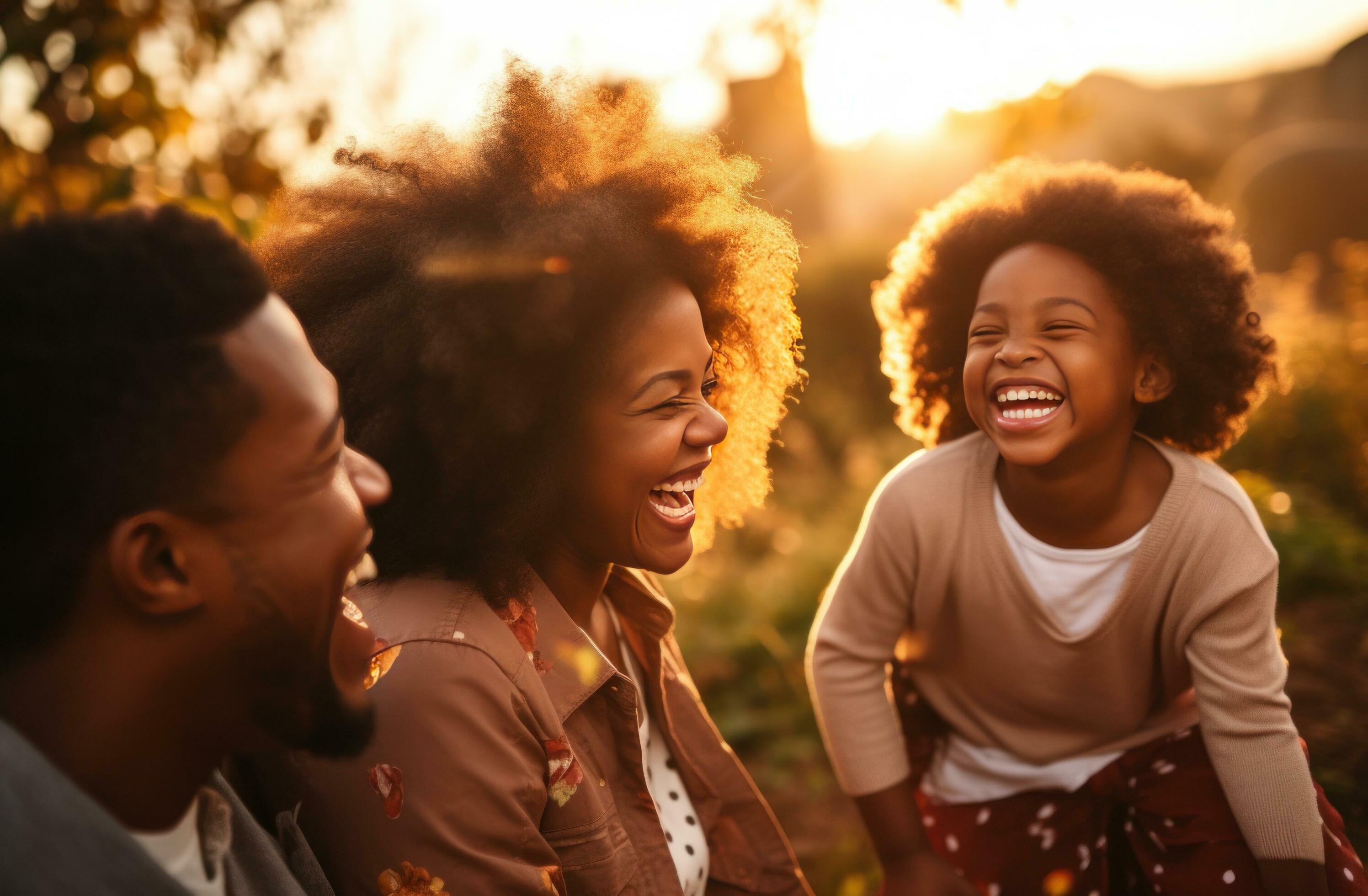 AI generated an african american family laughing together at sunset Stock Free