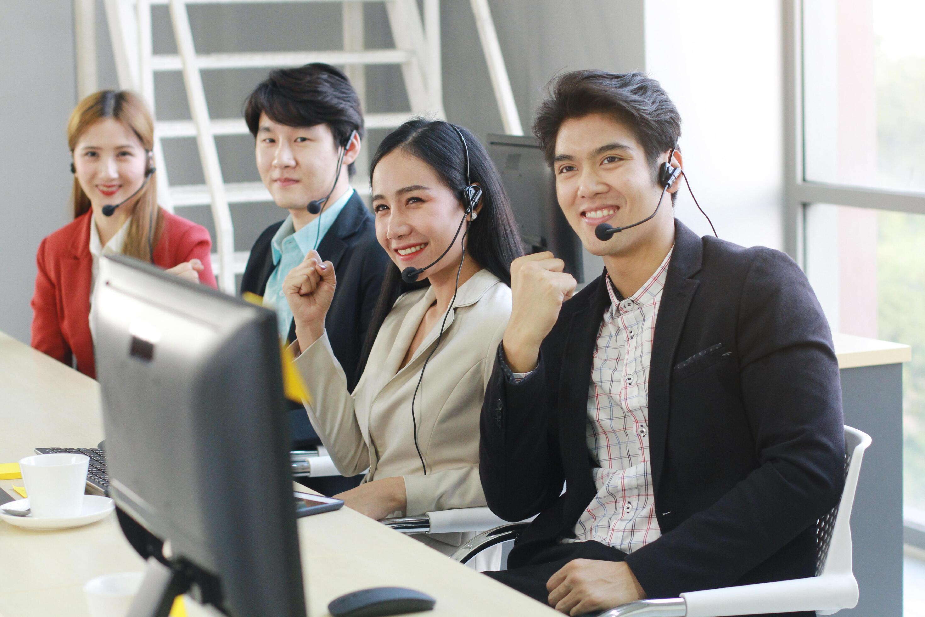 Powerful and Sucessful of Business group Call Center and technical Support staff for receptionist phone operator. Asian customer support team. Stock Free