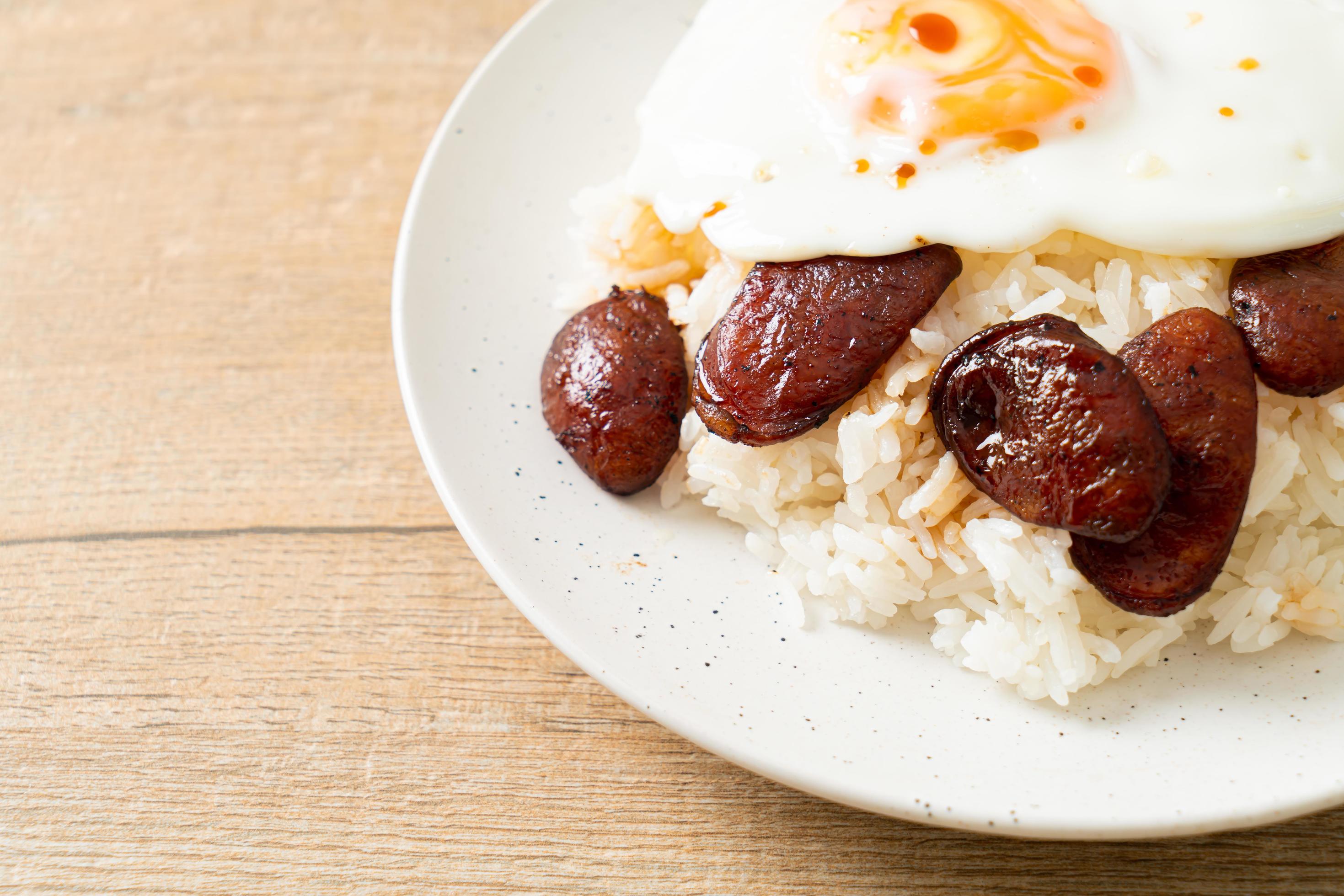 Rice with fried egg and Chinese sausage – Homemade food in Asian style Stock Free