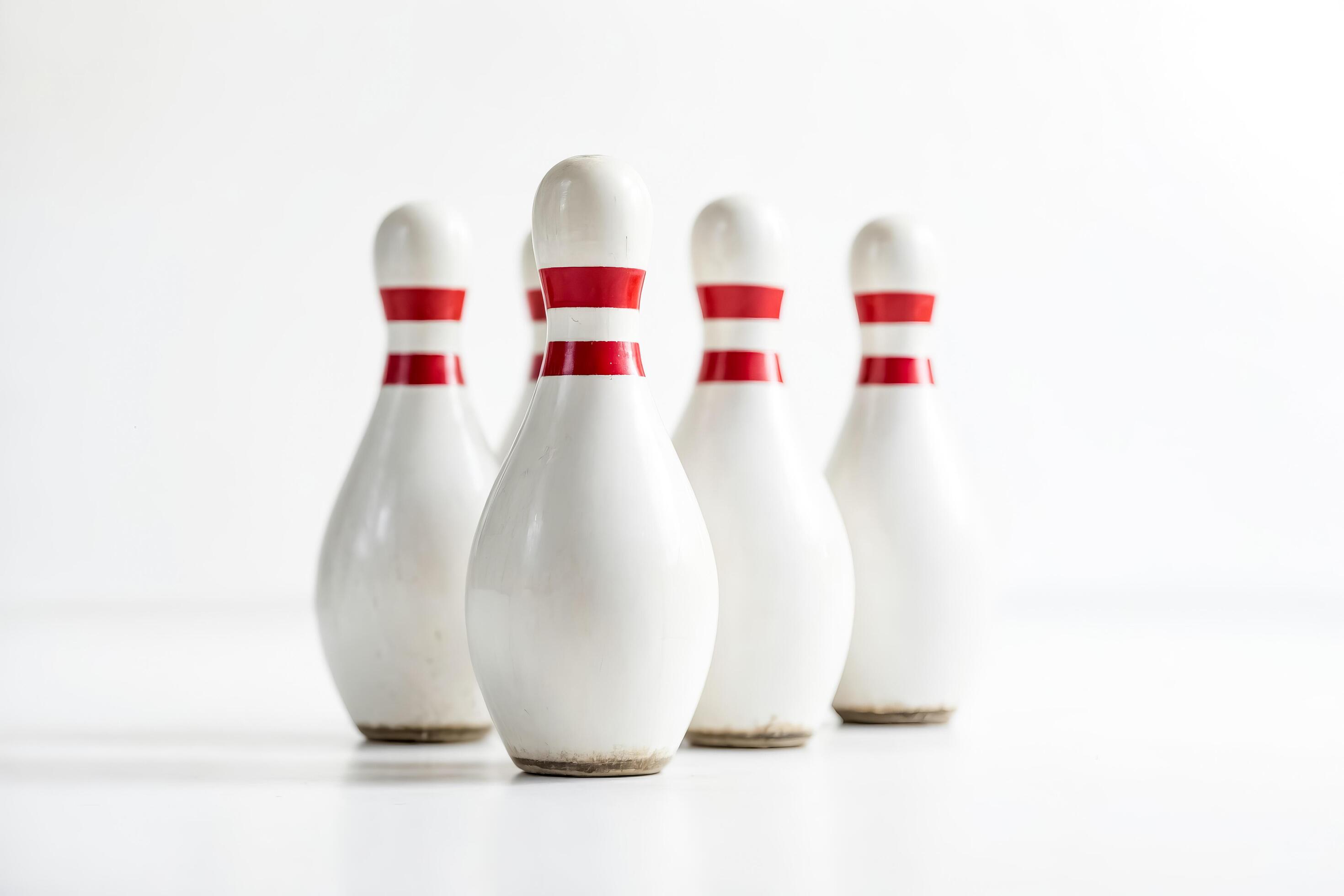 White Bowling Pins on a White Background Stock Free