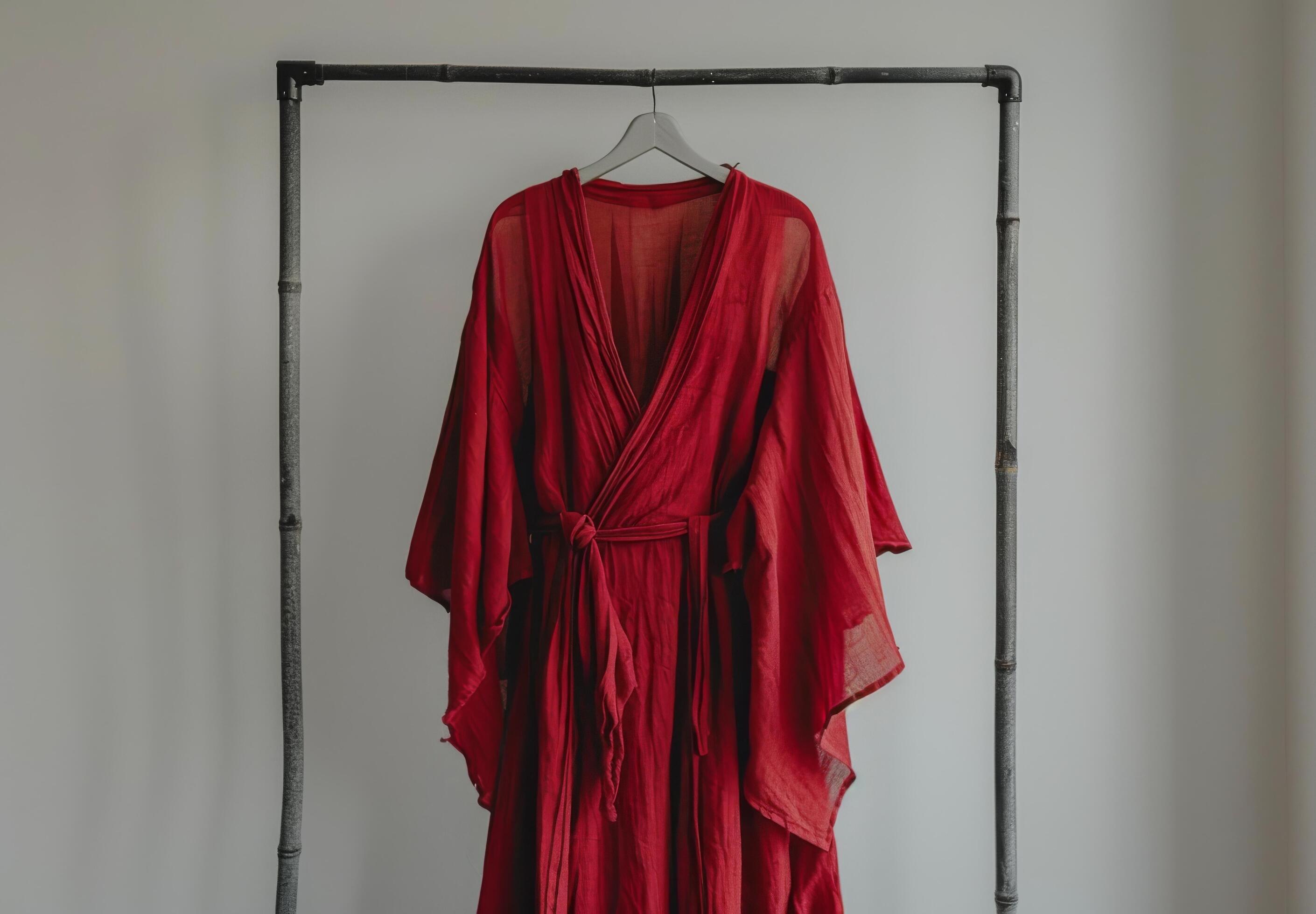 Red Kimono Robe Hanging On Clothes Rack Stock Free