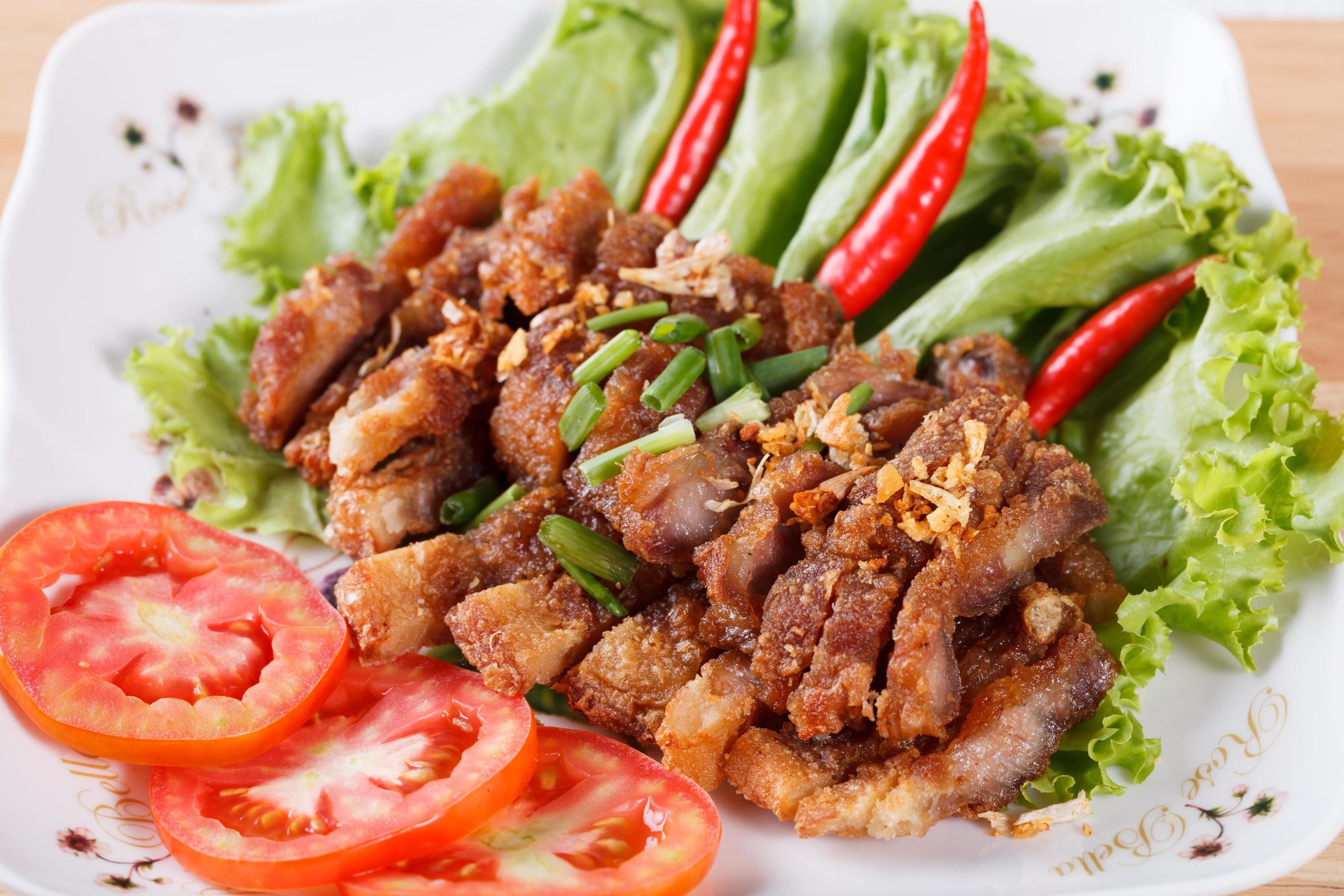 streaky pork fried with spicy dipping sauce, Thai food Stock Free