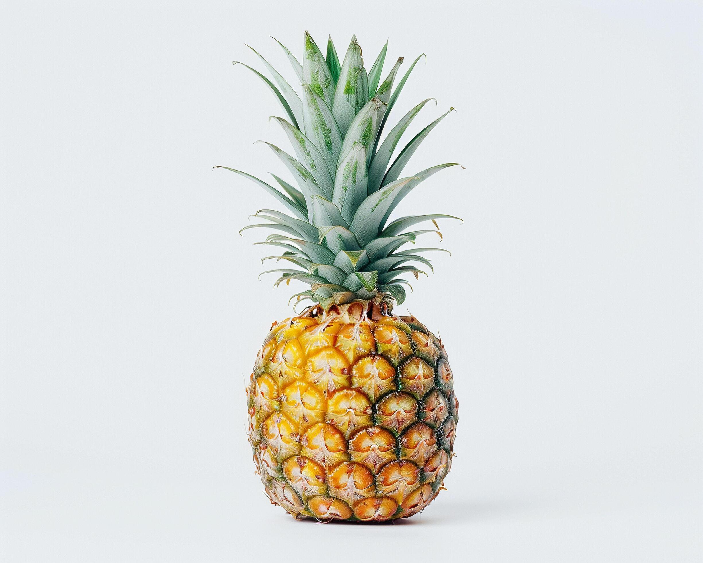 a pineapple is shown on a white background Stock Free