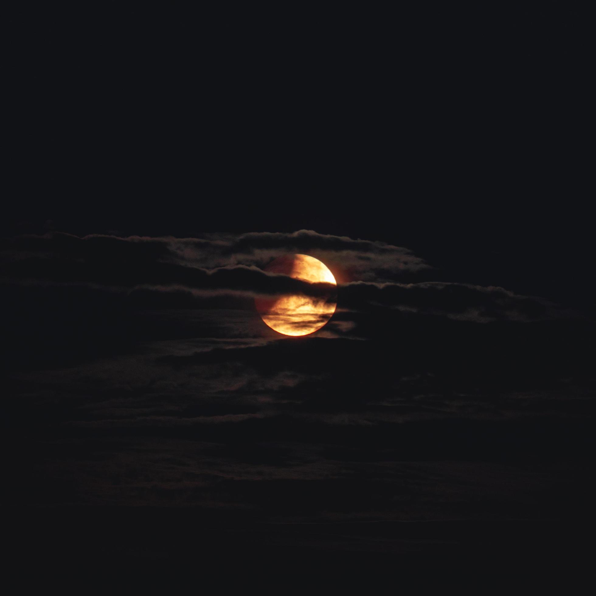 Full moon with clouds, in The Netherlands. Stock Free