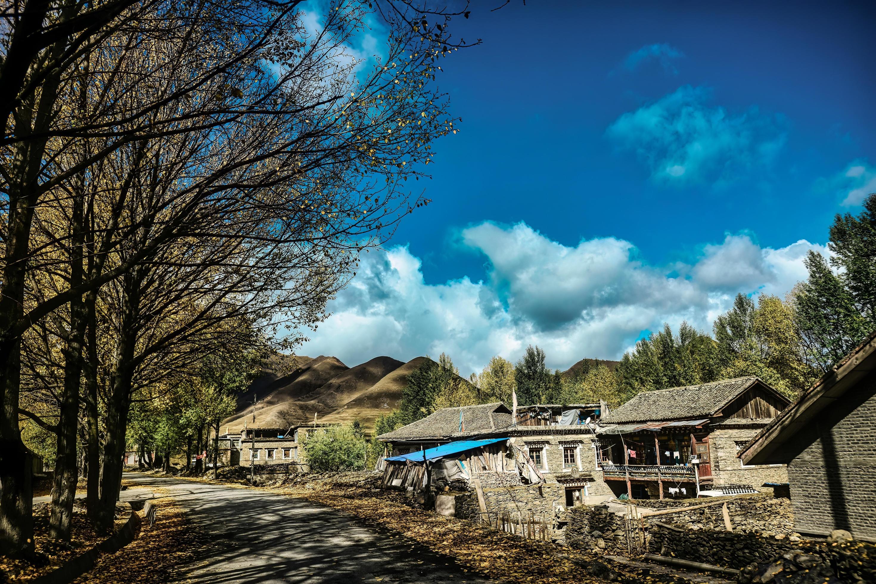 Spectacular scenery in the high mountains of western Sichuan, China, with different seasons Stock Free