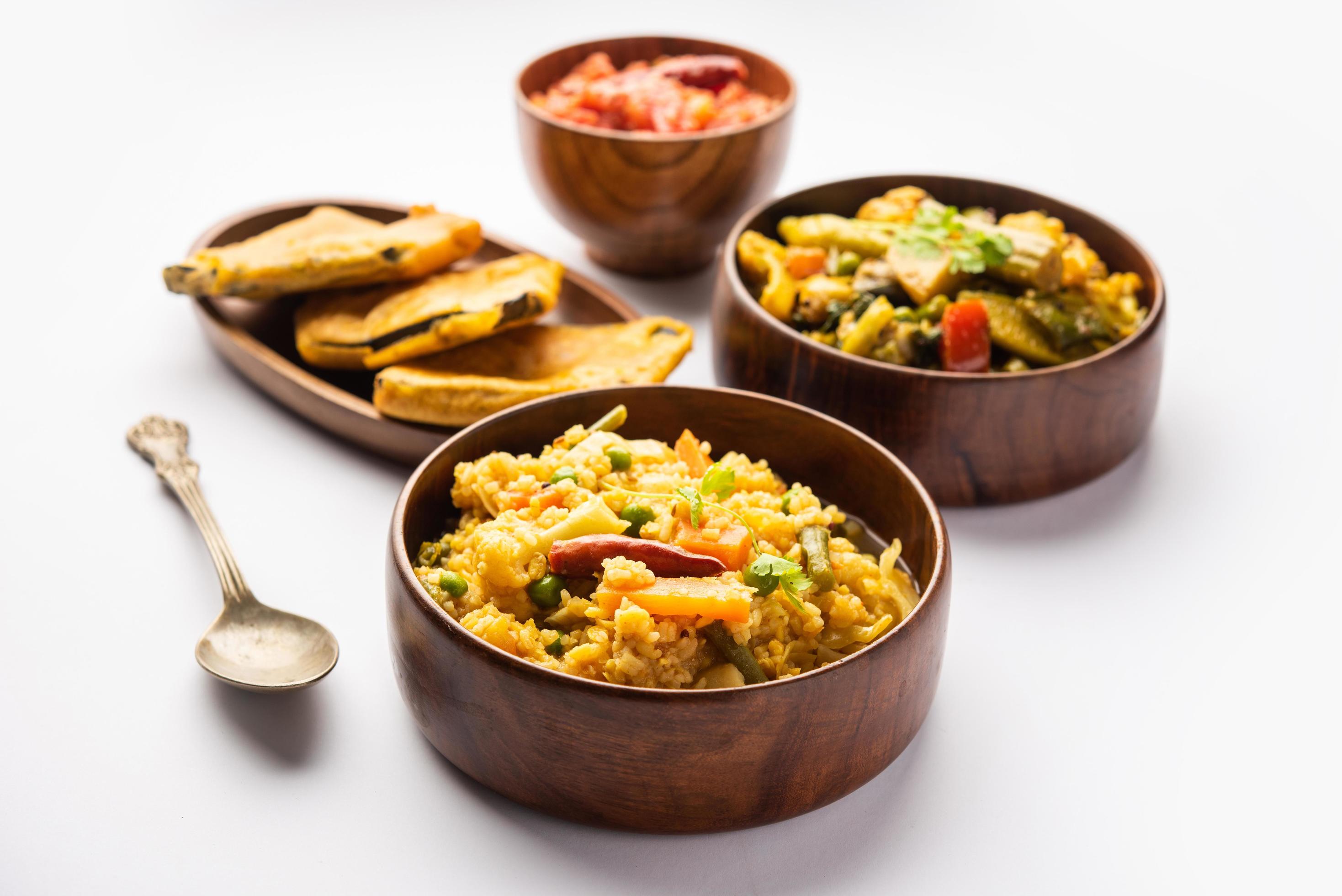 Bengali Bhog food for Indian Hindu Durga Puja or pooja festival. Khichadi, labra, tomato chutney Stock Free