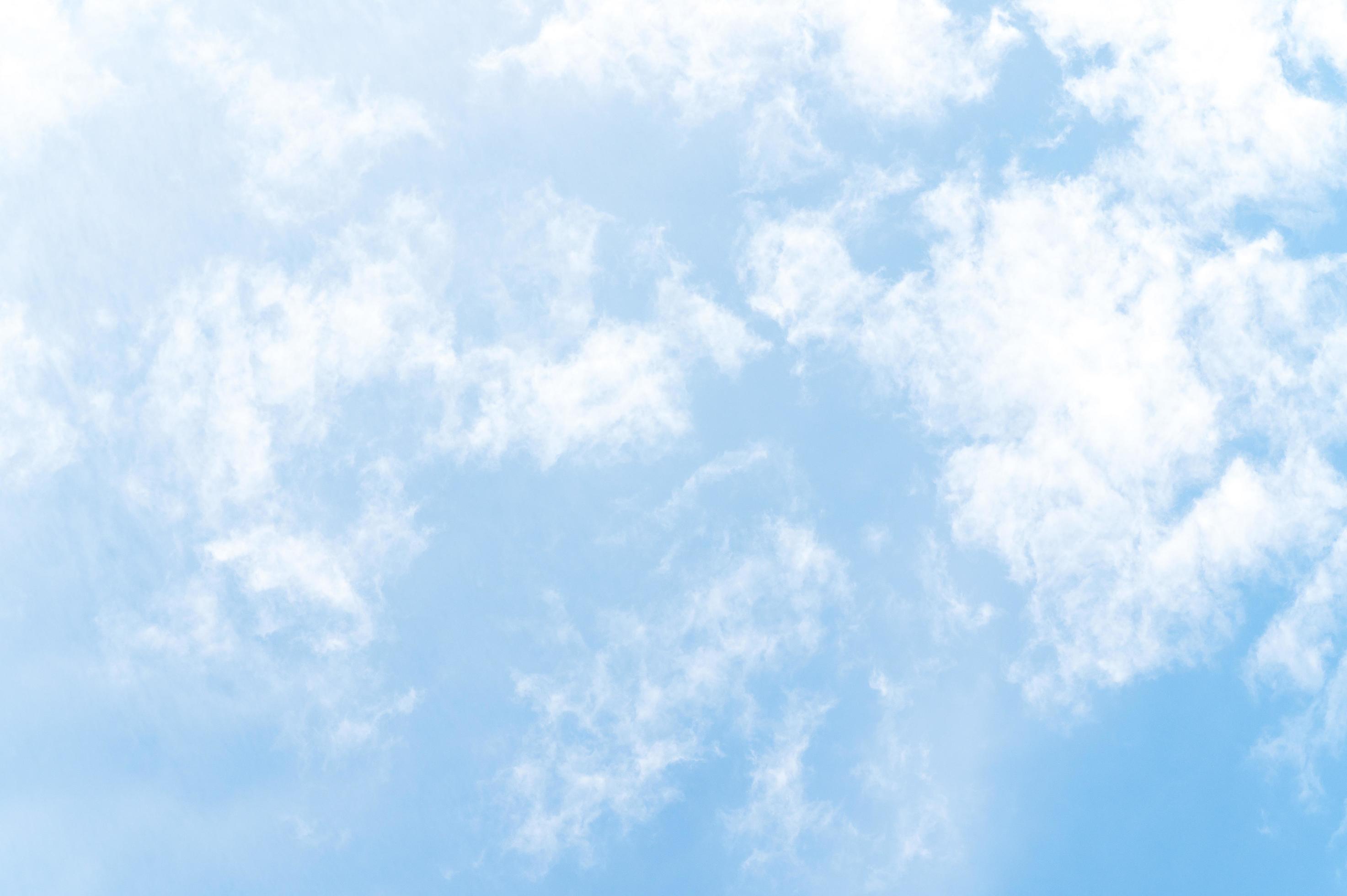 Beautiful white fluffy clouds in blue sky. Nature background from white clouds in sunny day Stock Free