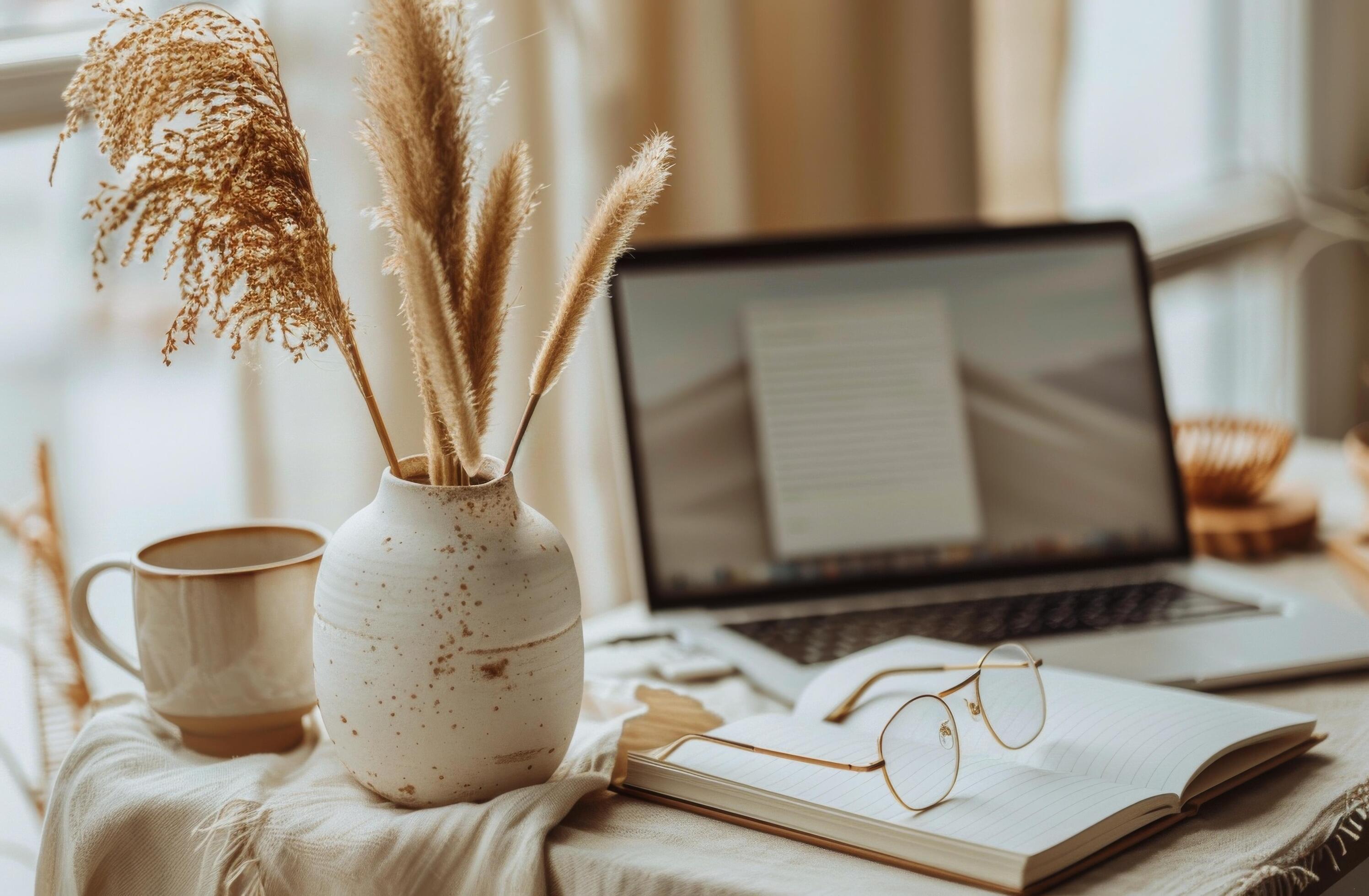 A Cozy Workspace With Dried Pampas Grass and an Open Notebook Stock Free