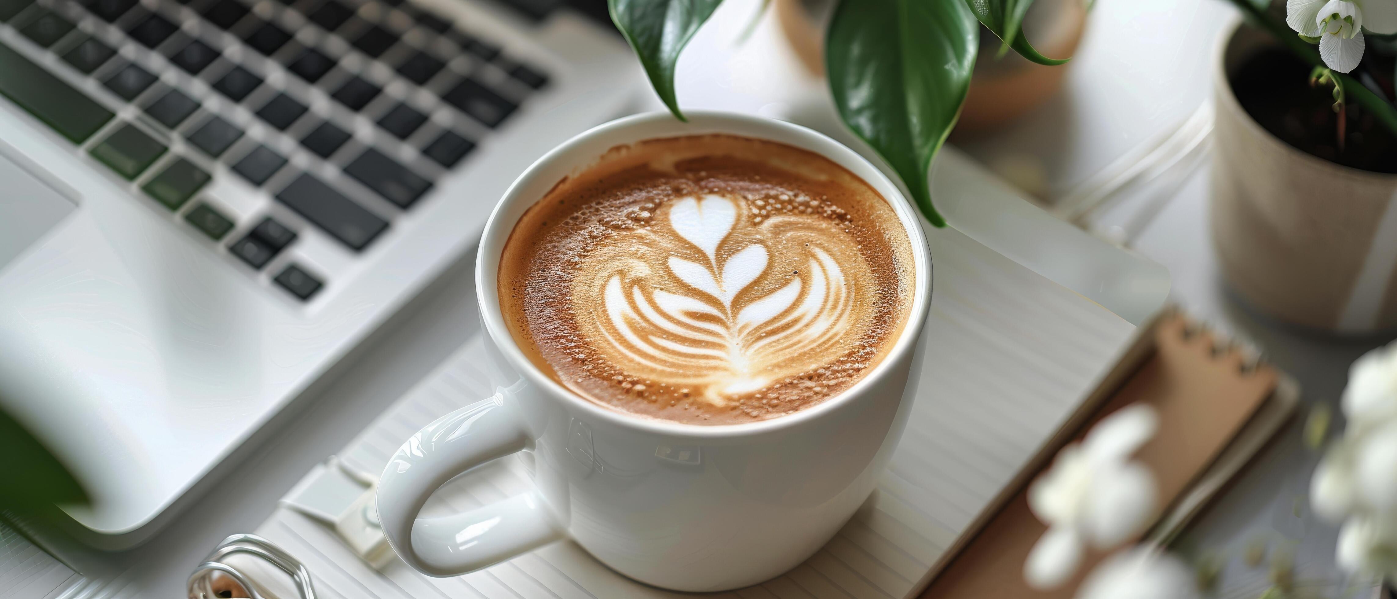 A Cup of Coffee With Laptop and Plants on a White Table Stock Free