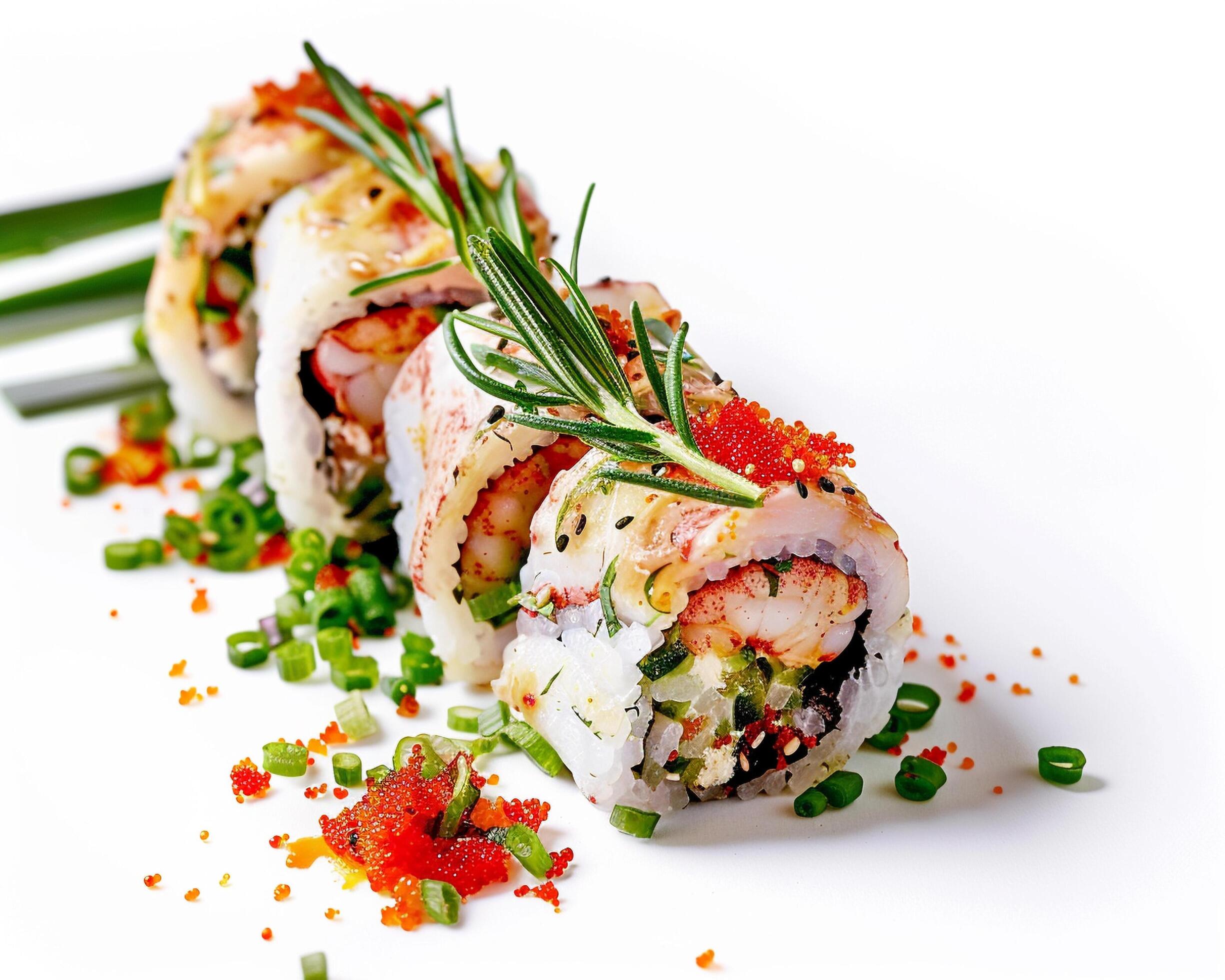 a sushi roll with vegetables and herbs on top Stock Free