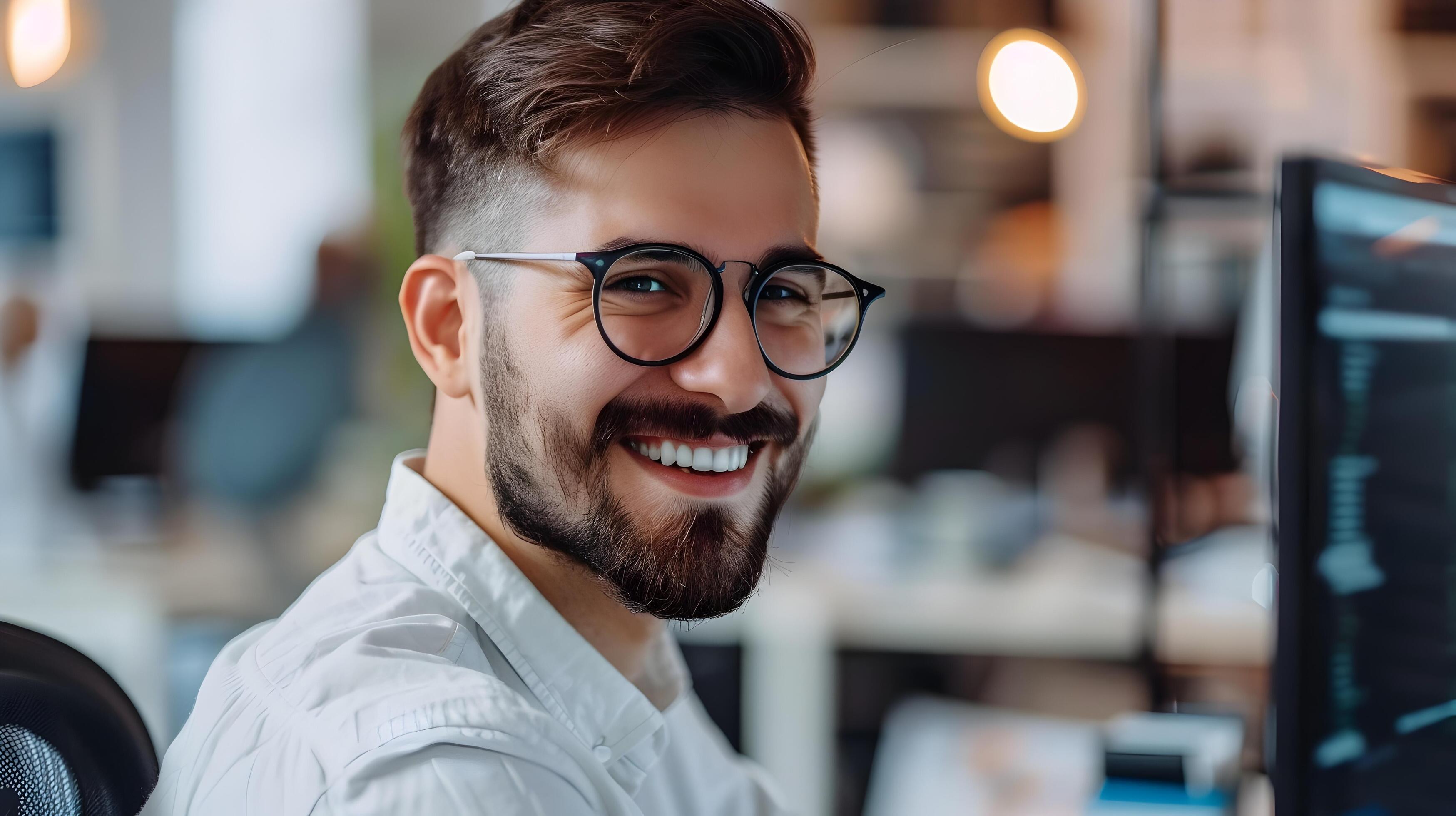 Confident Young Professional Scrum Master Working Diligently at Desk in Modern Office Stock Free