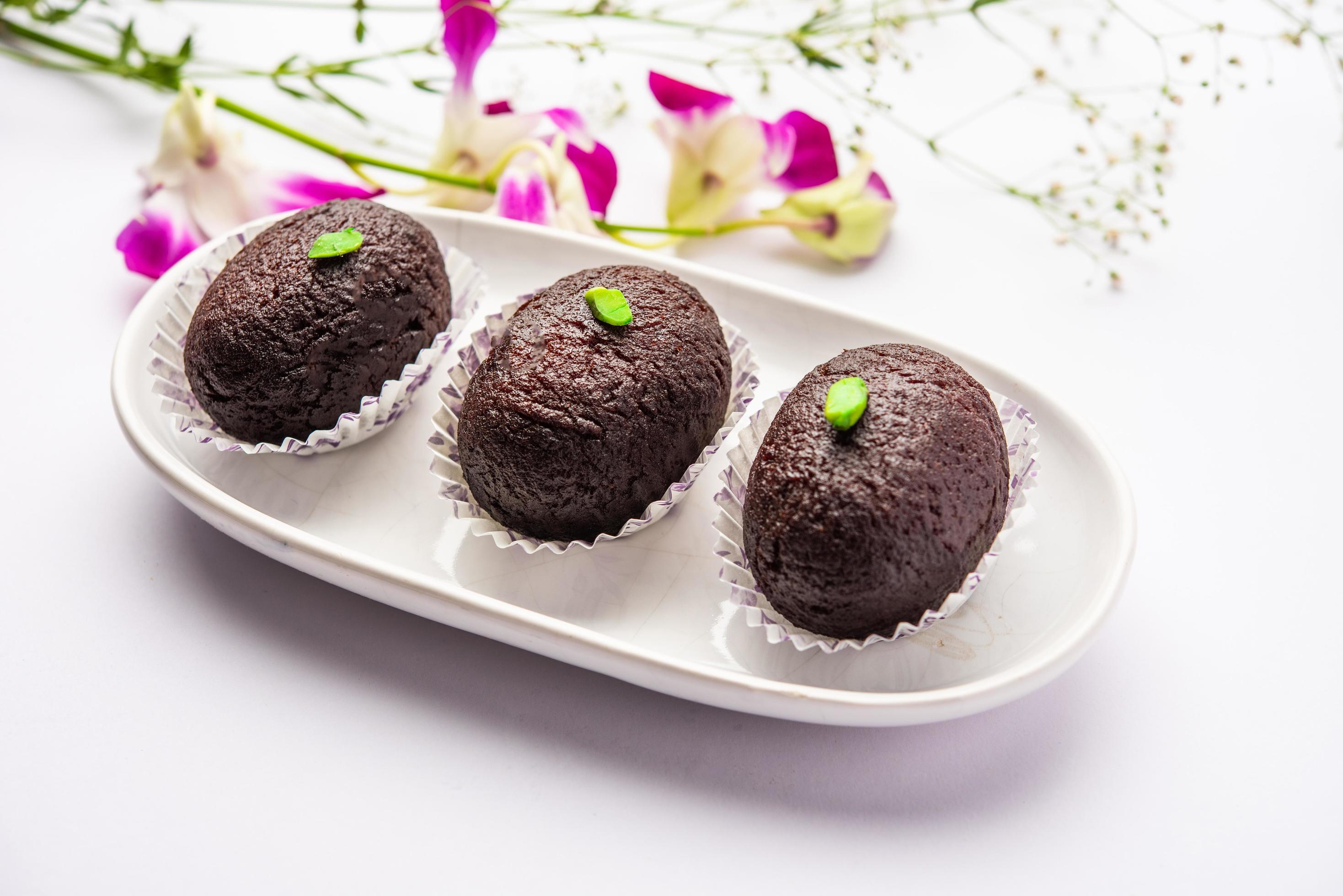 Indian Sweet Food Sweet Black Gulab Jamun Also Known as Kala Jamun, Black Jamun or Dry Kala Jam Stock Free