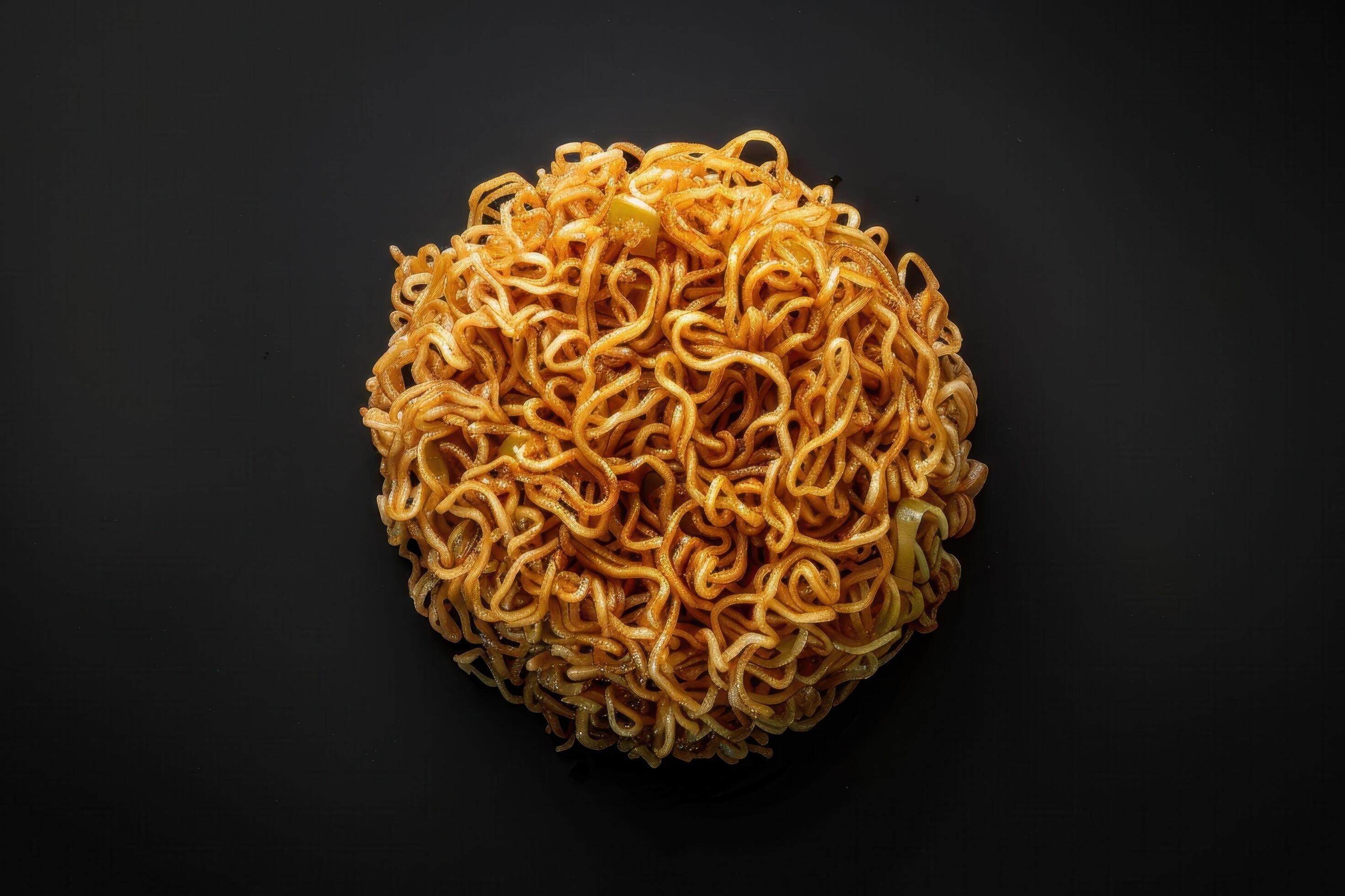 A Close-Up of Cooked Instant Noodles on a Black Background Stock Free