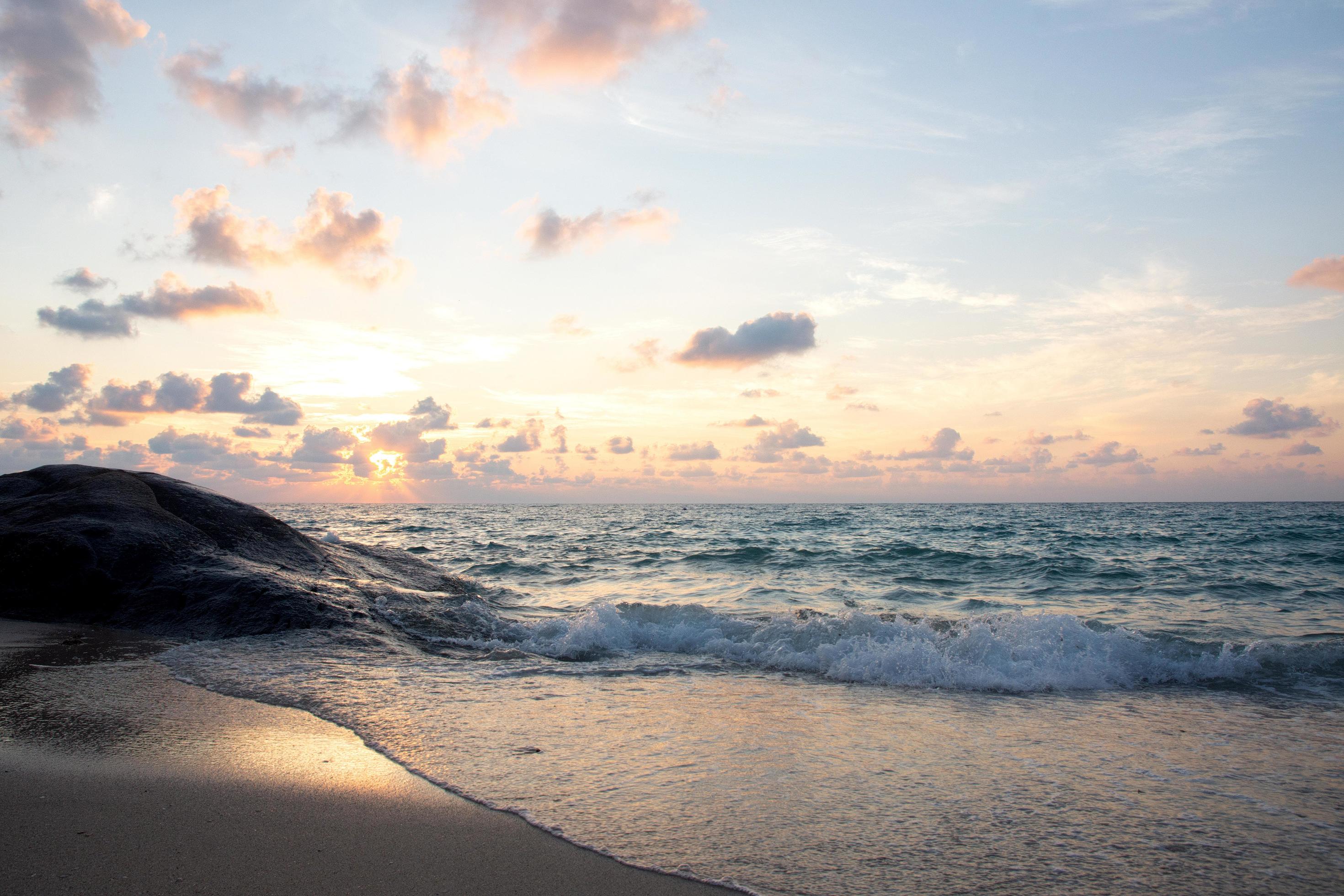 Natural tropical sea at sunrise background Stock Free