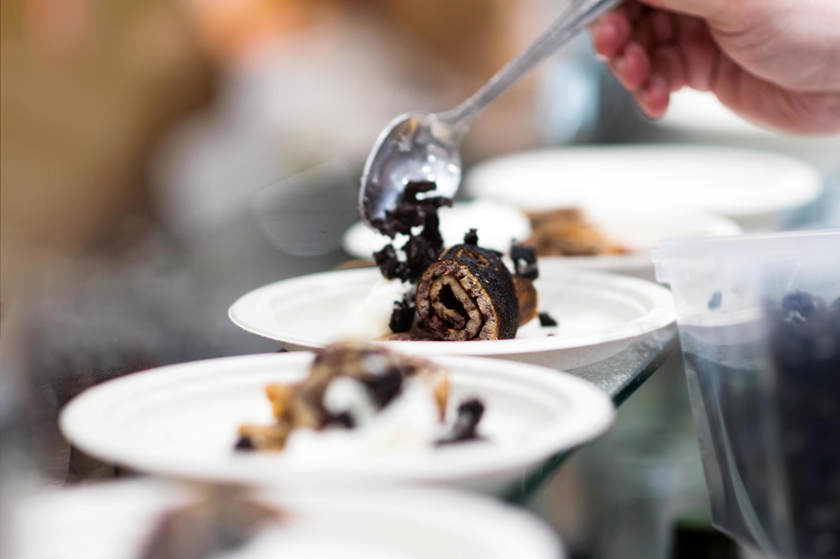 Chef preparing food in the kitchen, Chef decorating dish, closeup Stock Free