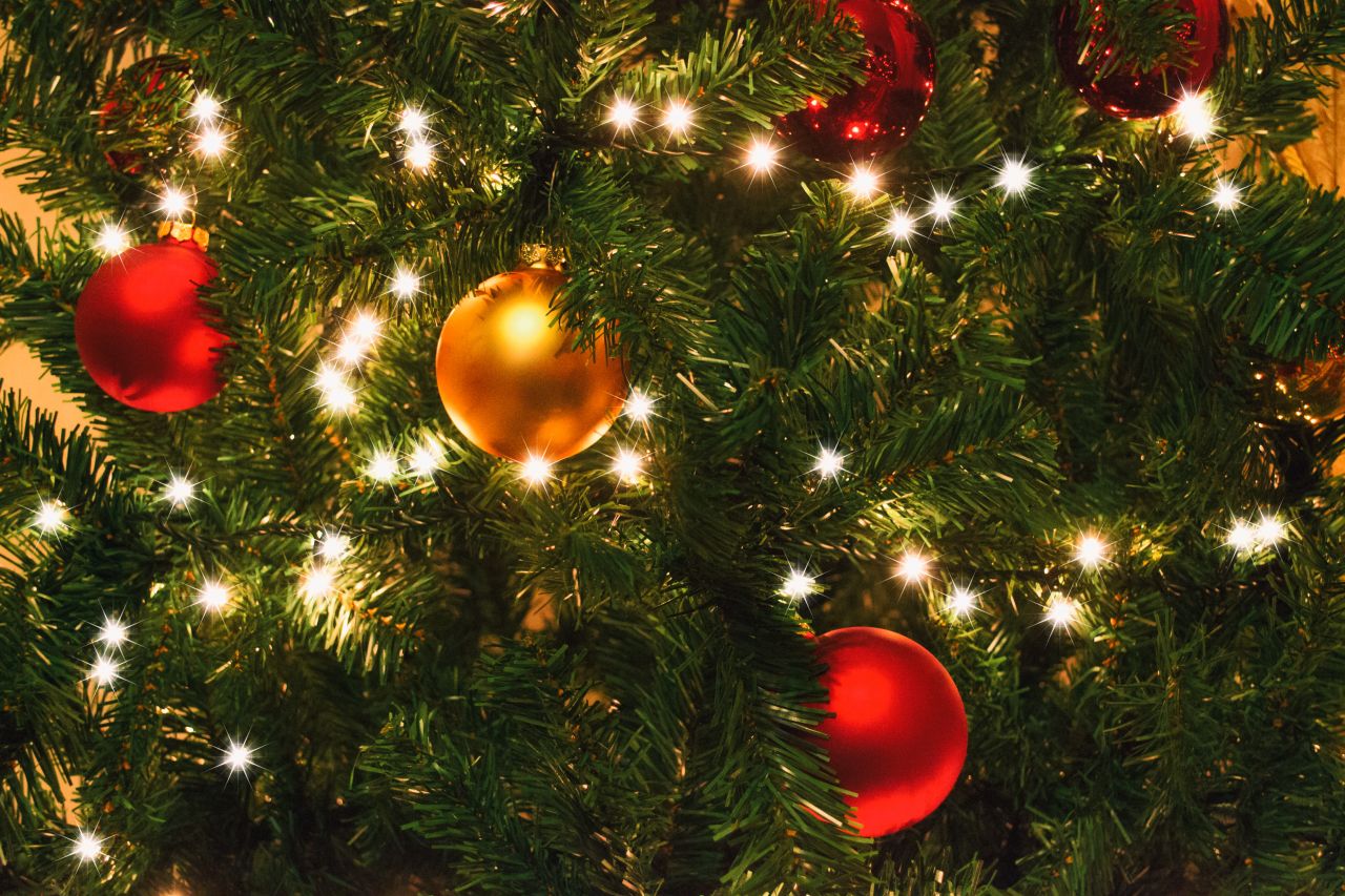 Christmas Tree Details with Lights and Colored Christmas Balls Stock Free