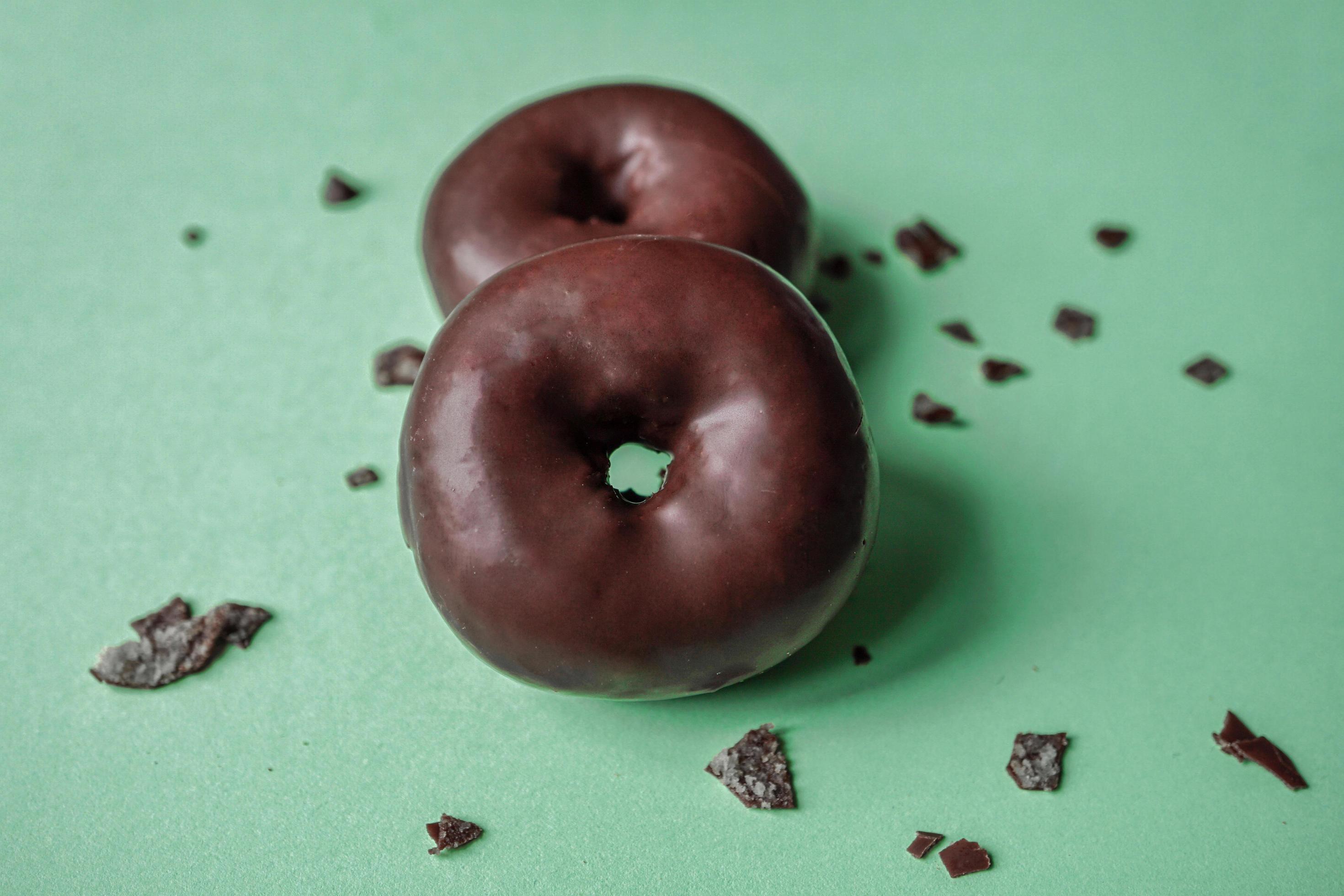 tasty chocolate donuts for breakfast, unhealthy food Stock Free