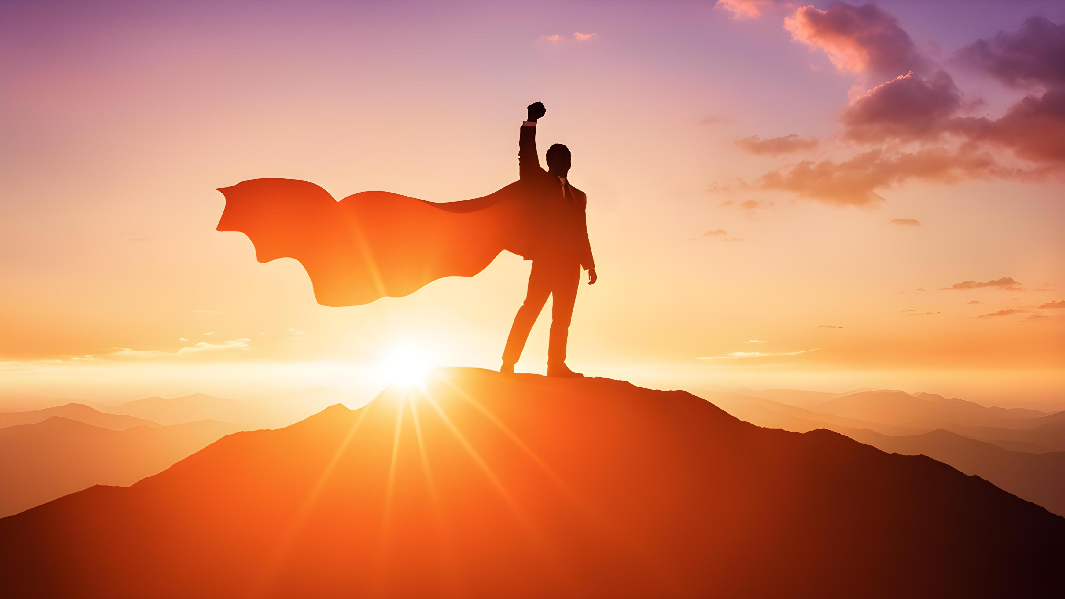 Silhouette businessman wearing cape and rise fist up on top of mountain. concept of business success, leadership, target goal achieve, winner Stock Free