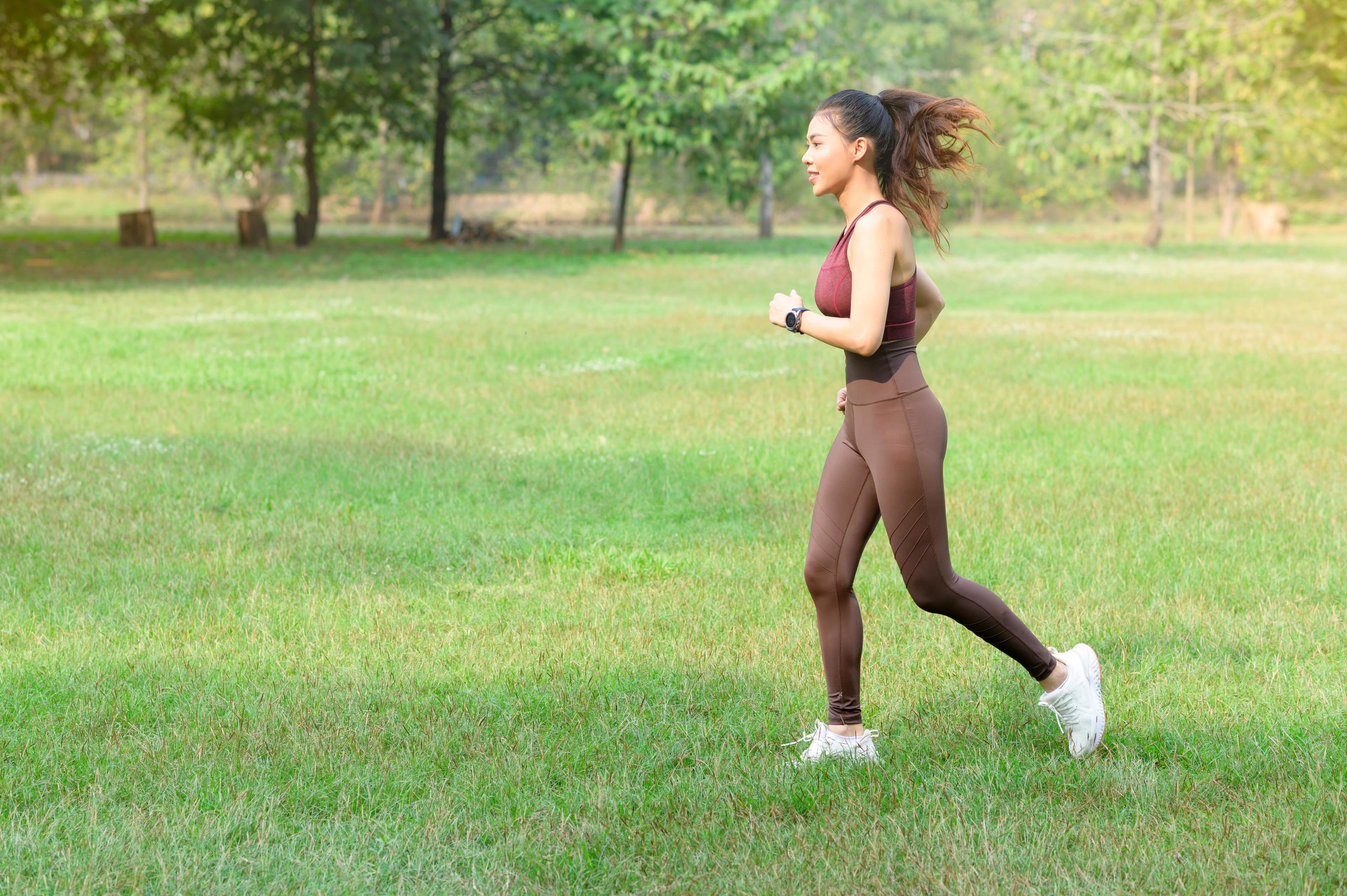 Beautiful Asian women exercise in the park every morning, It is a lifestyle for relaxation and good health of the body Stock Free