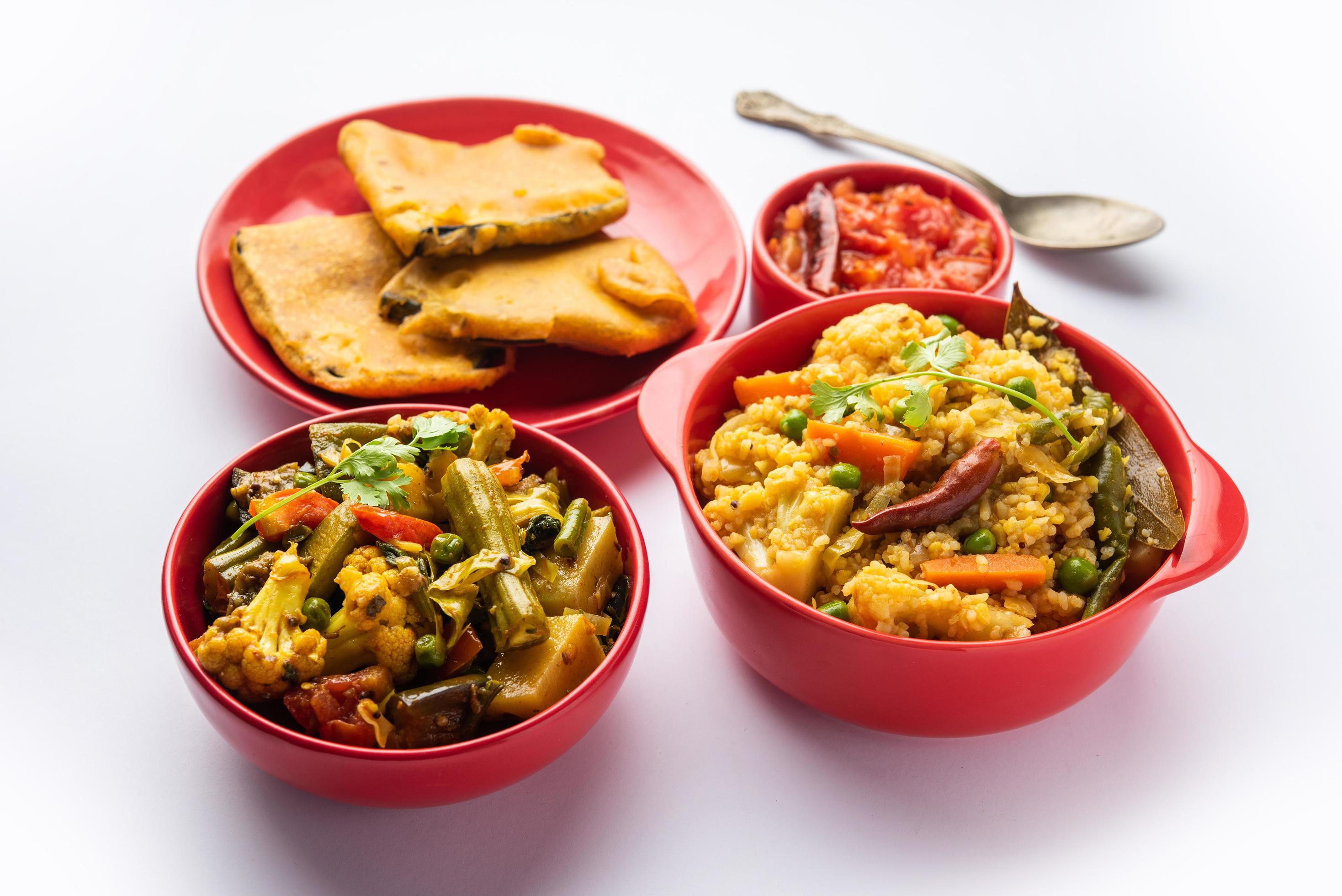 Bengali Bhog food for Indian Hindu Durga Puja or pooja festival. Khichadi, labra, tomato chutney Stock Free