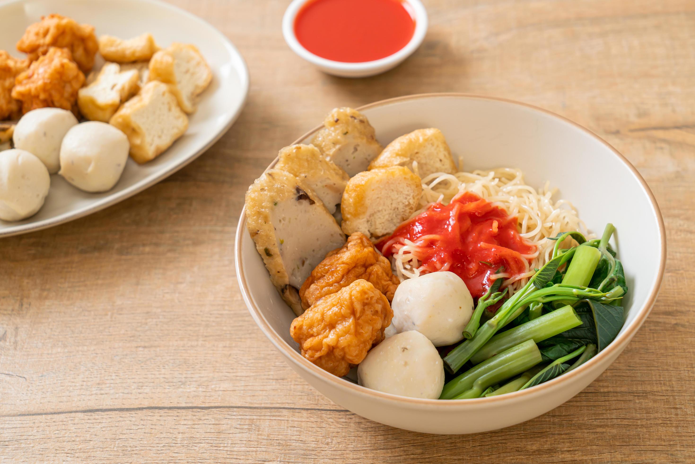 Egg noodles with fish balls and shrimp balls in pink sauce, Yen Ta Four or Yen Ta Fo – Asian food style Stock Free