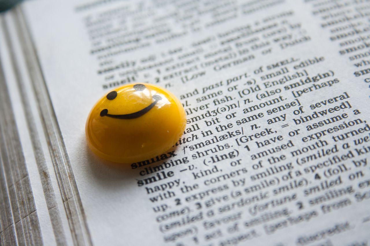 Yellow Smiley On Book Stock Free