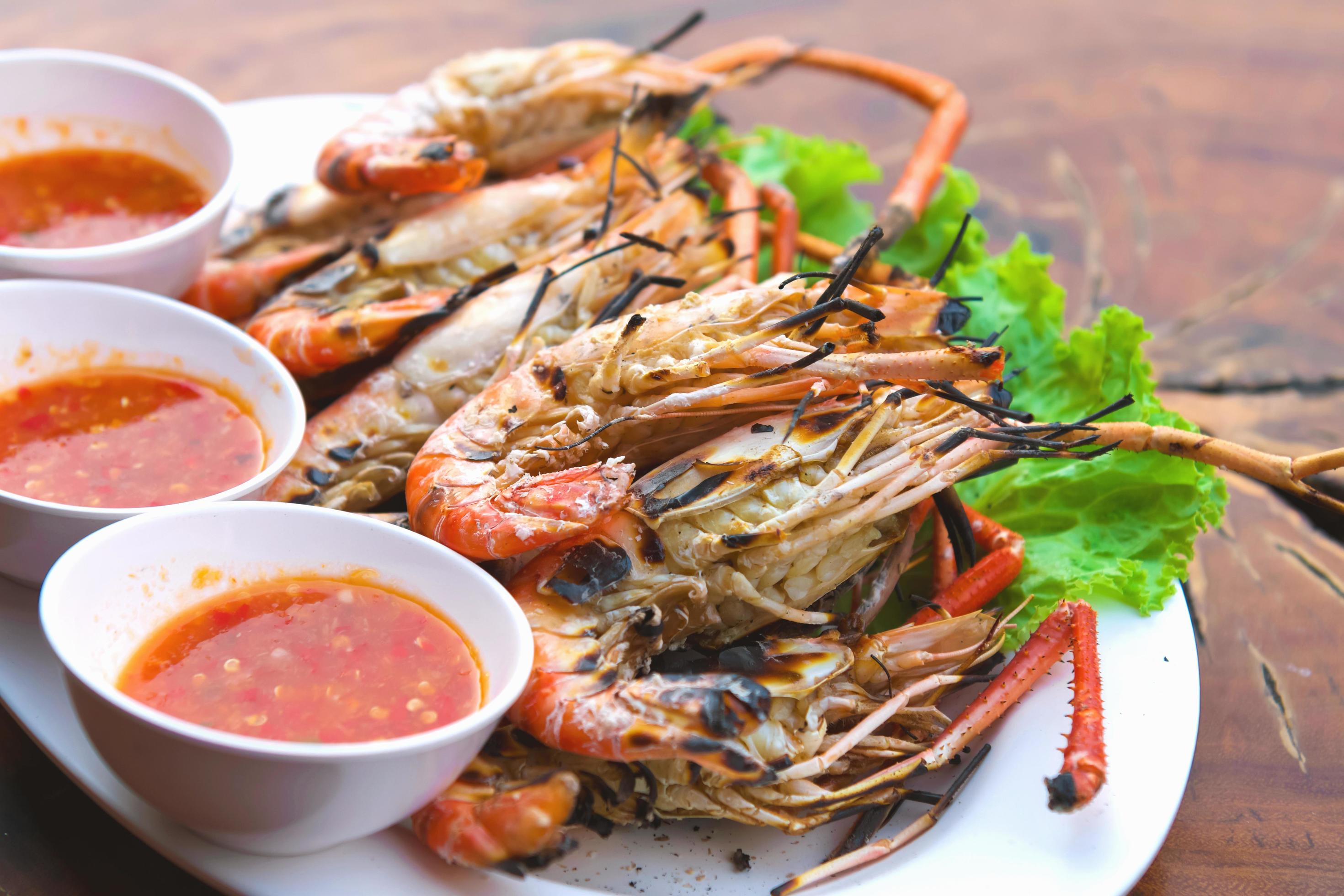 Burnt shrimp sea food on dish Stock Free