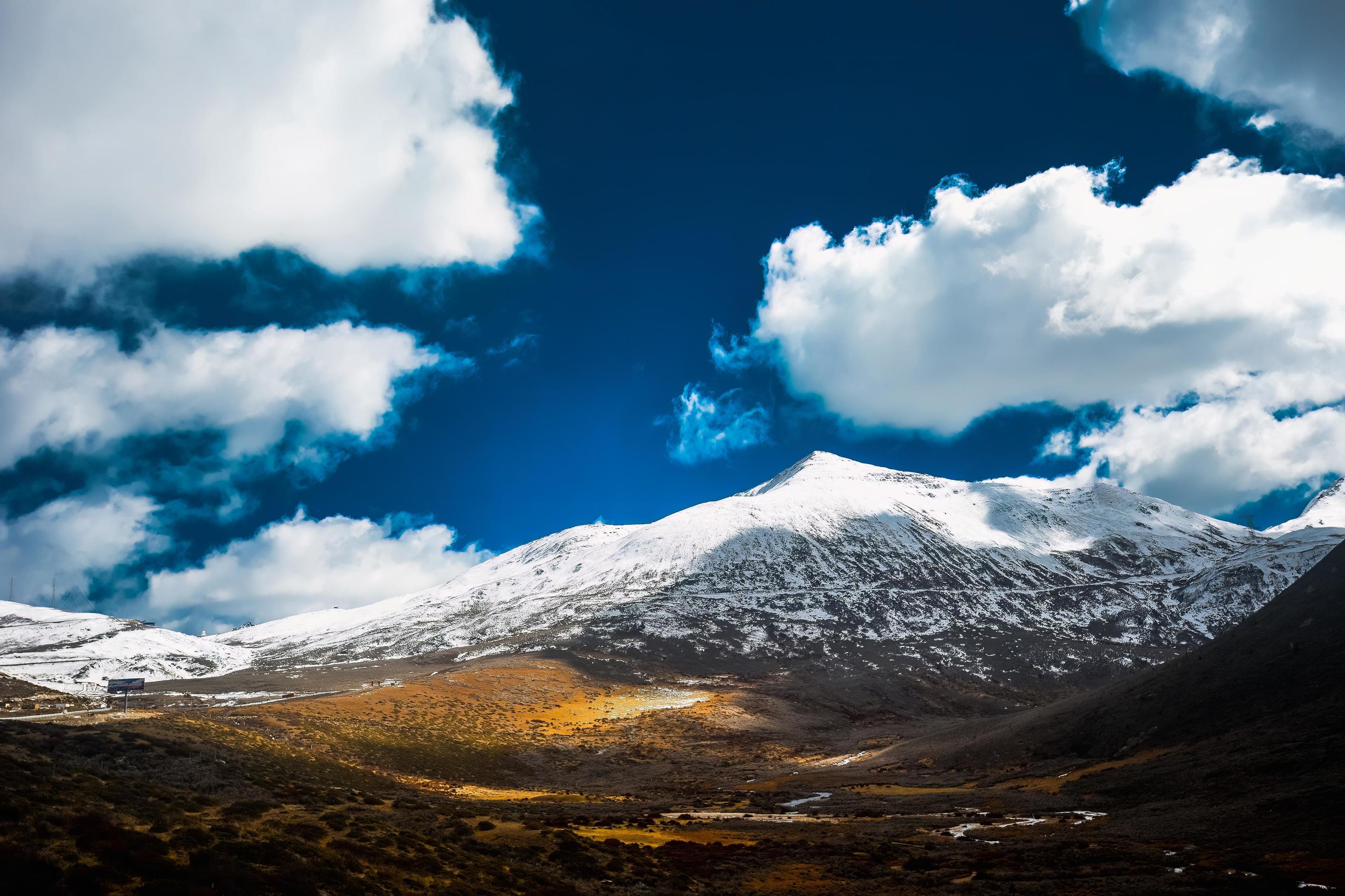 Spectacular scenery in the high mountains of western Sichuan, China, with different seasons Stock Free