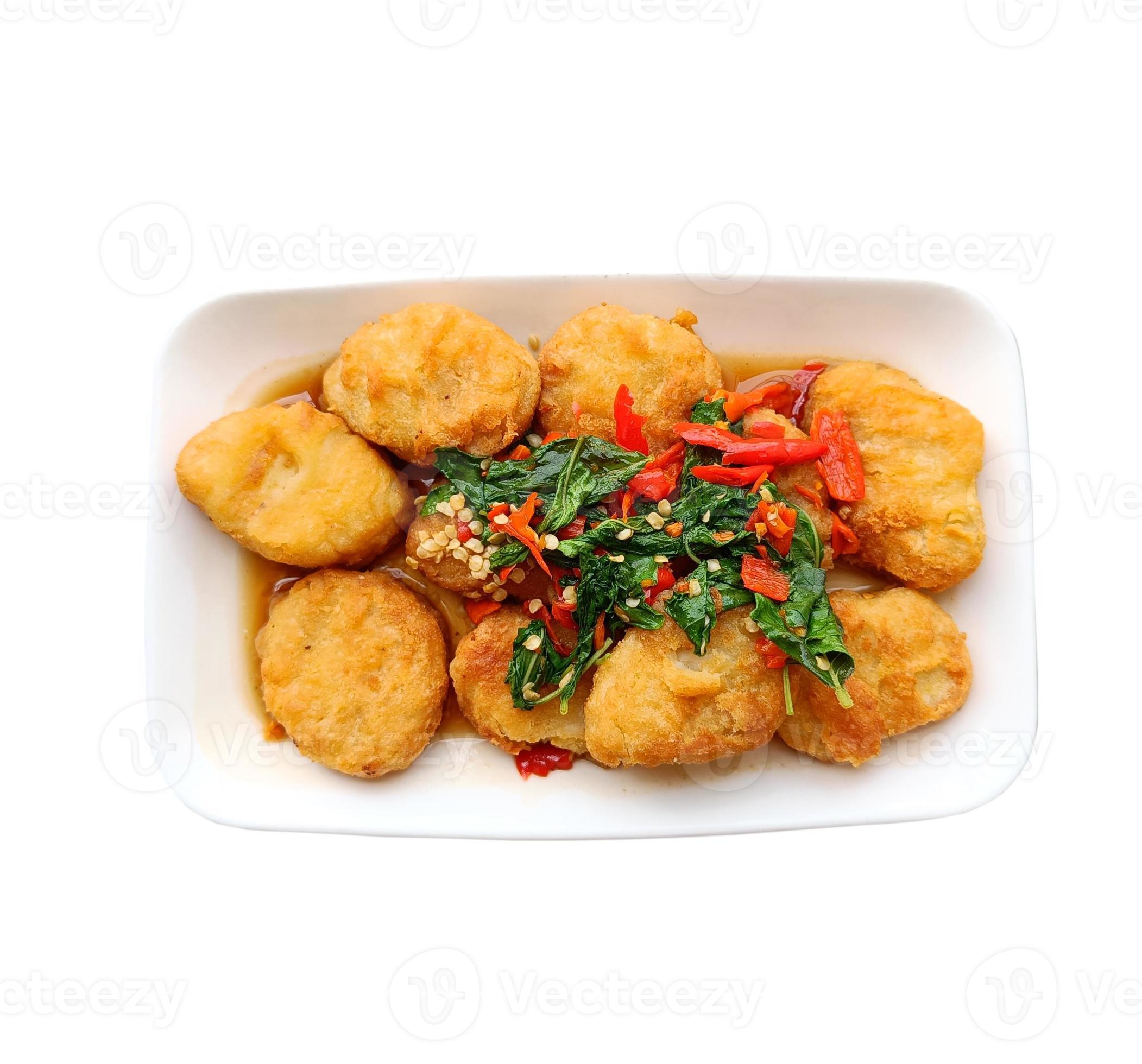 Basil Nuggets Spicy flavor on a white plate. Fusion Thai food. White background. Stock Free