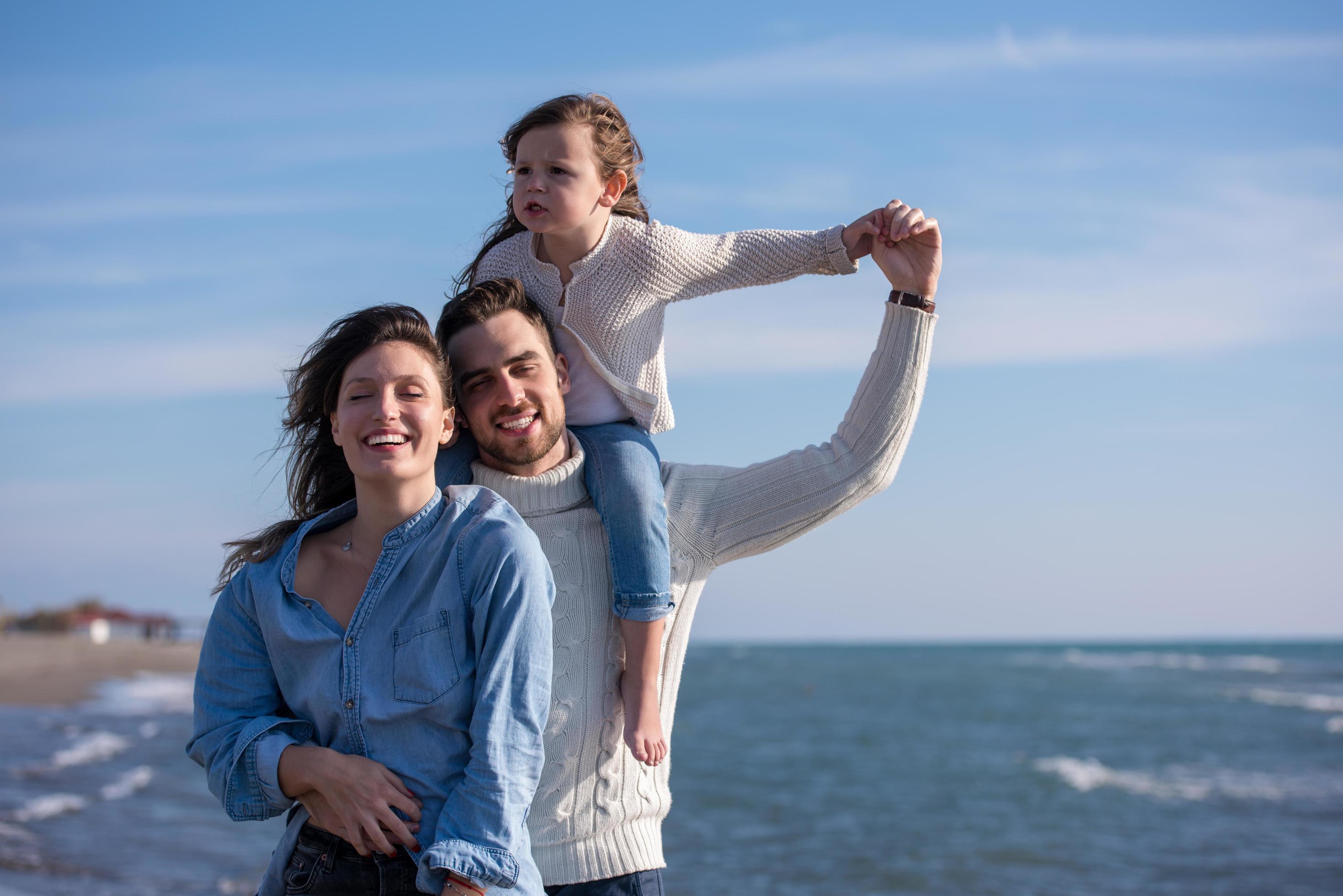 Young family enjoying vecation during autumn Stock Free