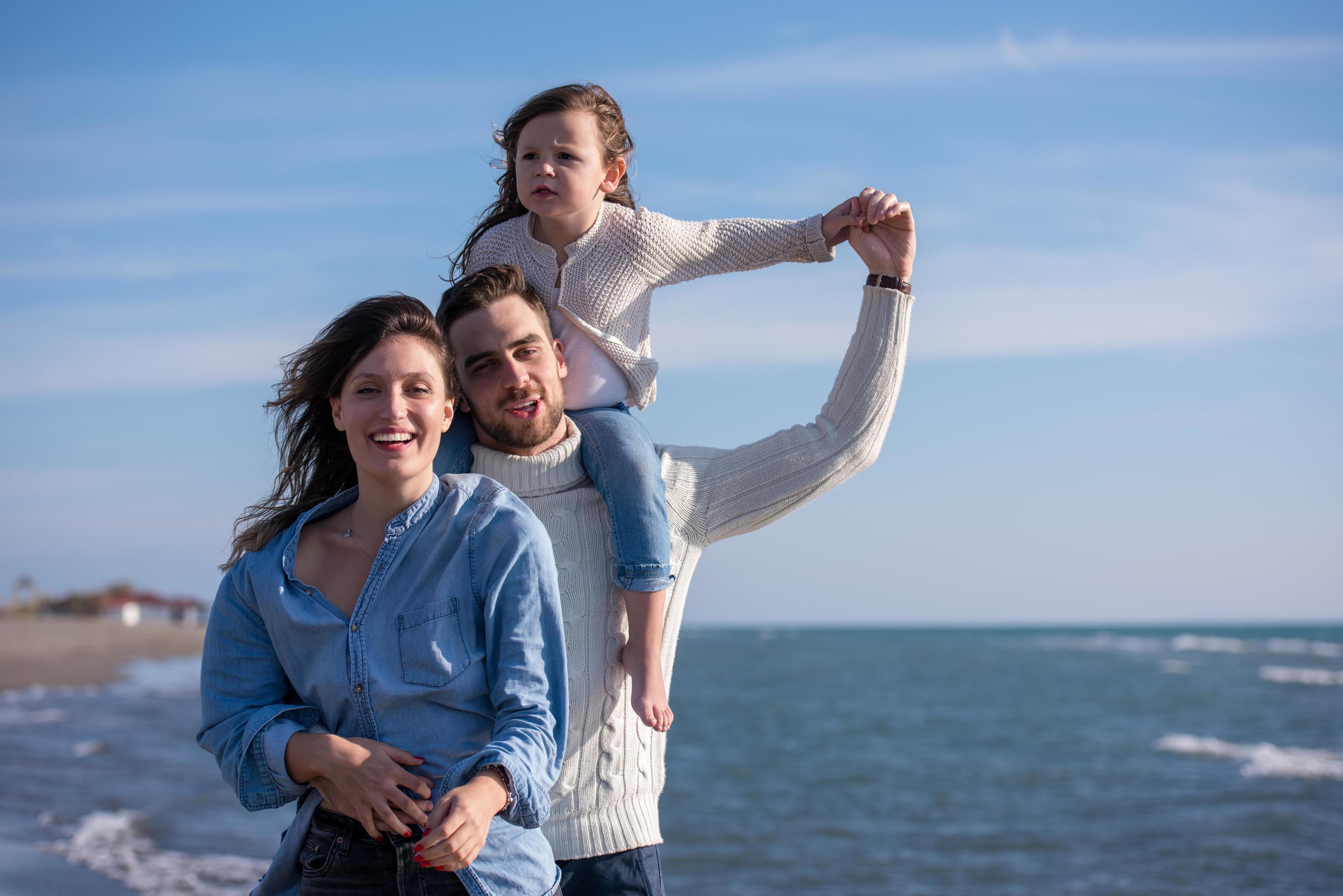 Young family enjoying vecation during autumn Stock Free