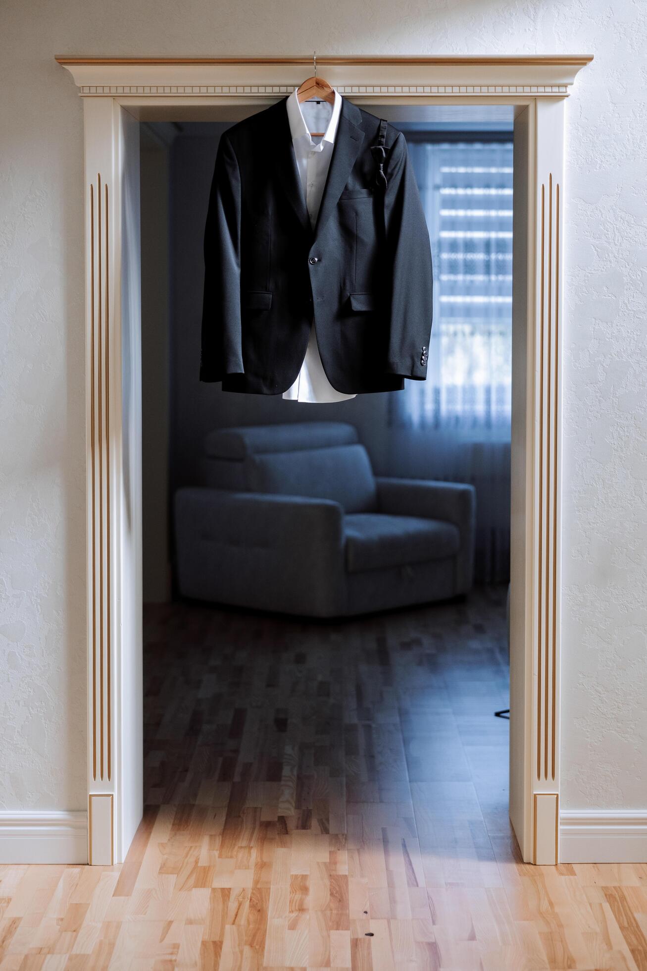 black men’s suit. The man is ready to wear a business suit, white shirt and tie. A black jacket on a mannequin Stock Free