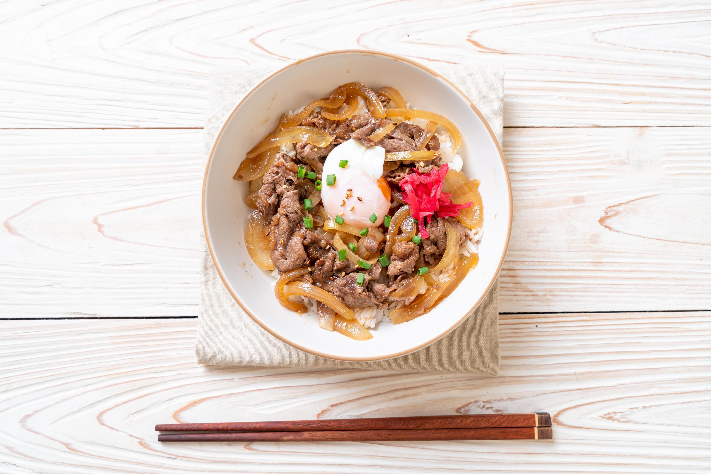 beef sliced on topped rice, or gyudon – Japanese food style Stock Free