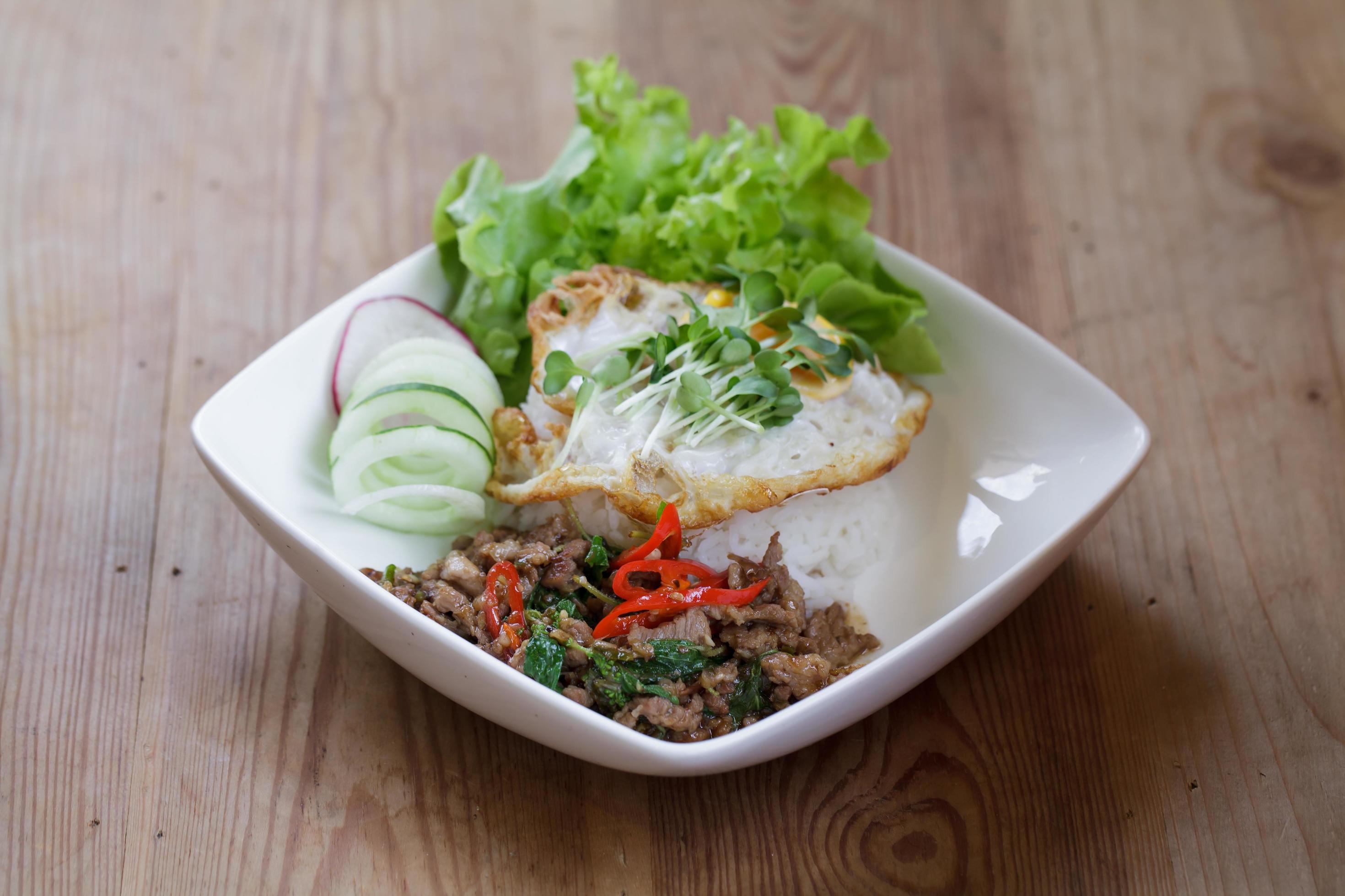 thai spicy food basil pork fried rice recipe with egg Stock Free