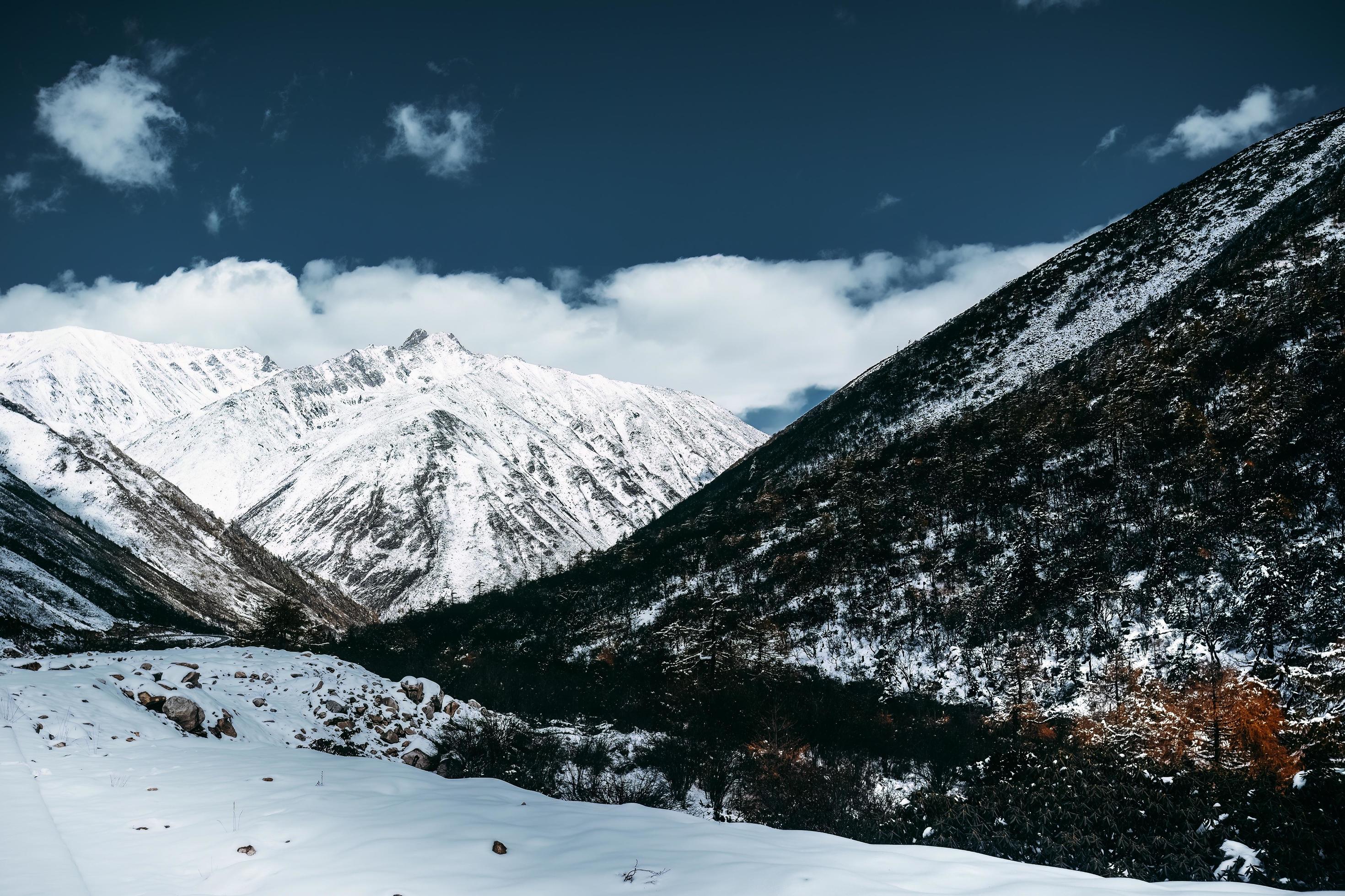 Spectacular scenery in the high mountains of western Sichuan, China, with different seasons Stock Free