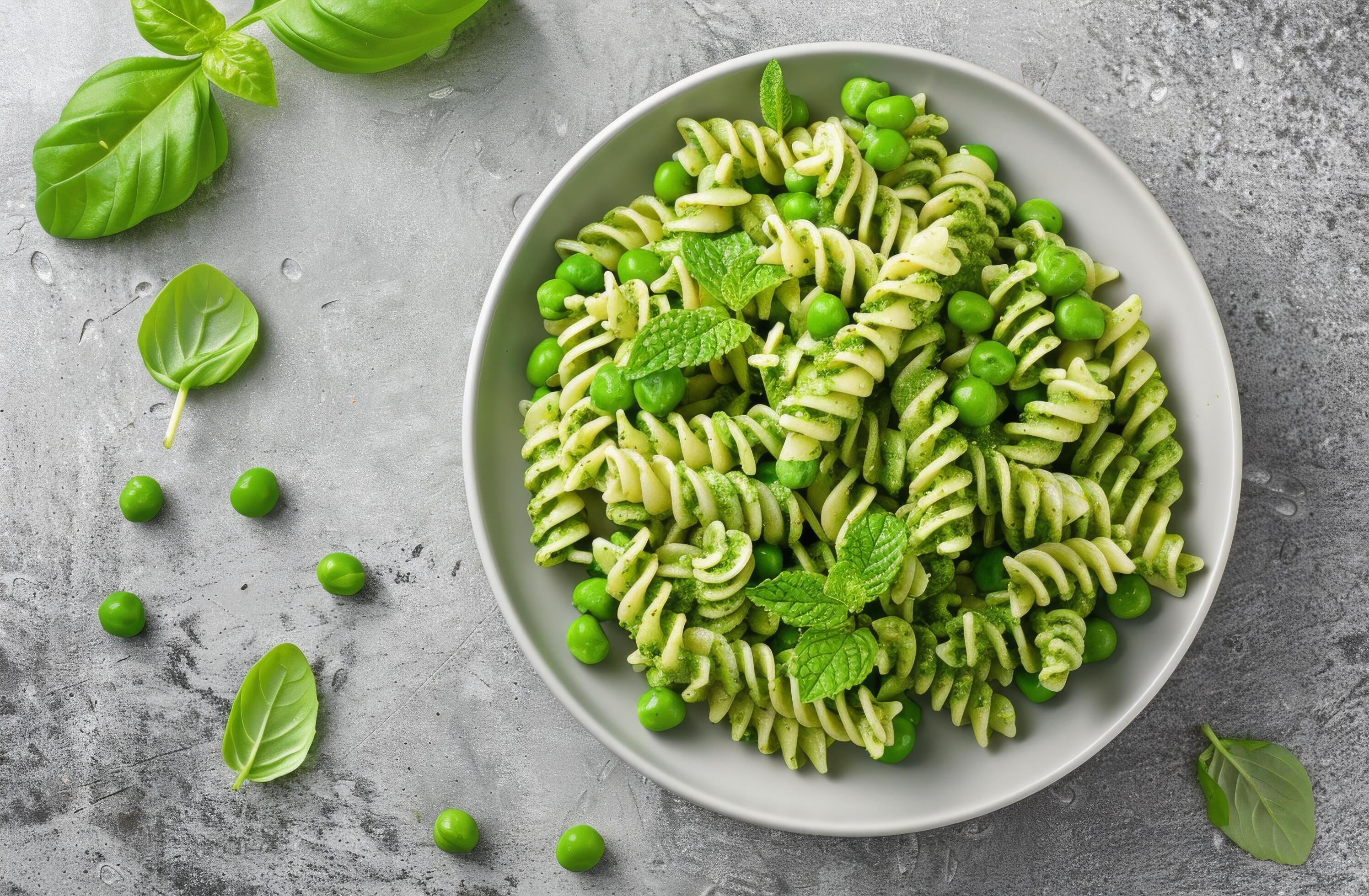 Fresh Green Pasta With Peas and Mint on a Grey Surface Stock Free